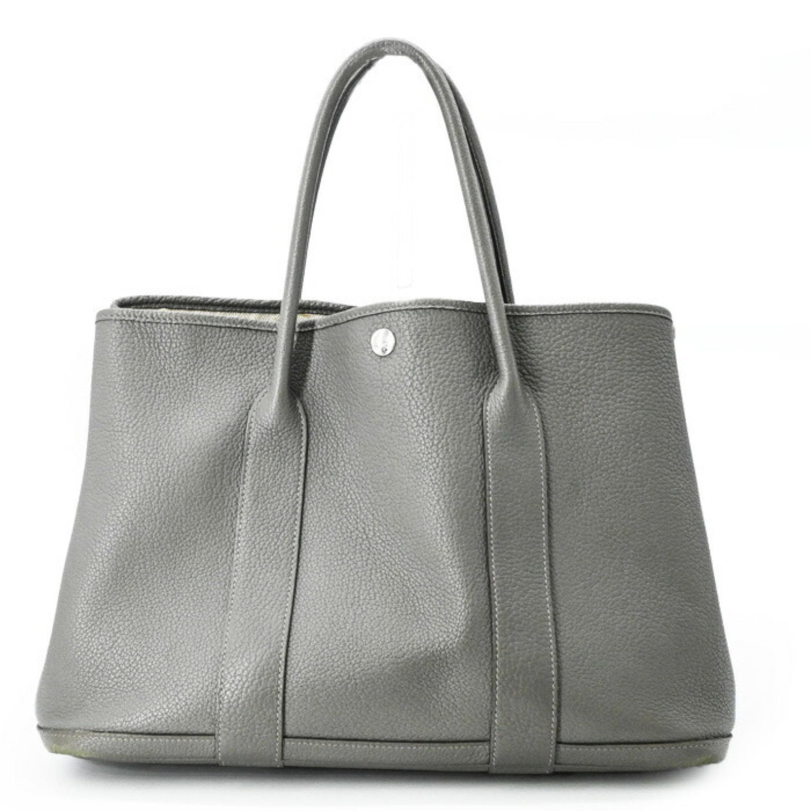 Hermes Handbag Tote Bag Negonda Leather: Hermes Handbag Tote Bag Negonda Leather Negonda leather tote bag from Hermes, crafted with a timeless gray hue, features a classic design and durable construction. Measuring 25.5cm x 36cm x 18cm,
