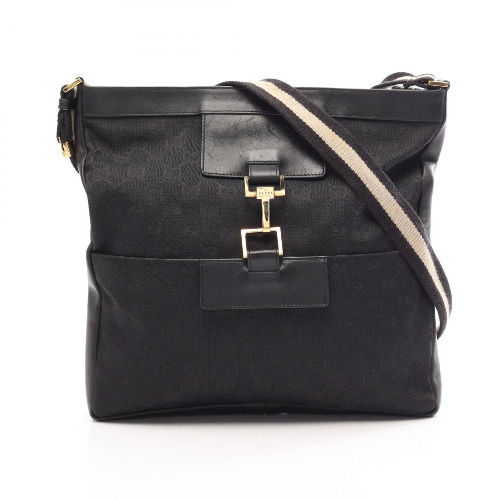 Shoulder Bag Gg Canvas Leather Handbag Gucci: Shoulder Bag Gg Canvas Leather Handbag Gucci GG canvas and leather combine in this sleek black shoulder bag from Gucci, measuring 31cm x 30cm x 4cm. The iconic GG canvas pattern adds a touch of