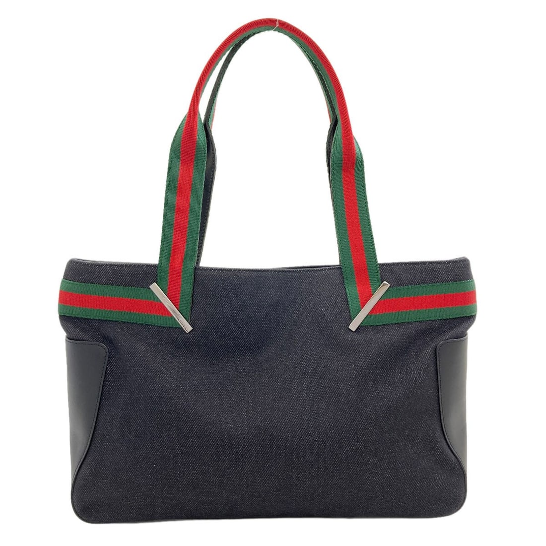 Sherry Gucci Canvas Handbag Line 73983: Sherry Gucci Canvas Handbag Line 73983 Black canvas handbag with a magnetic closure, measuring 8.7 inches in height and 2.8 inches in depth, featuring a signature on the work. The bag's exterior is