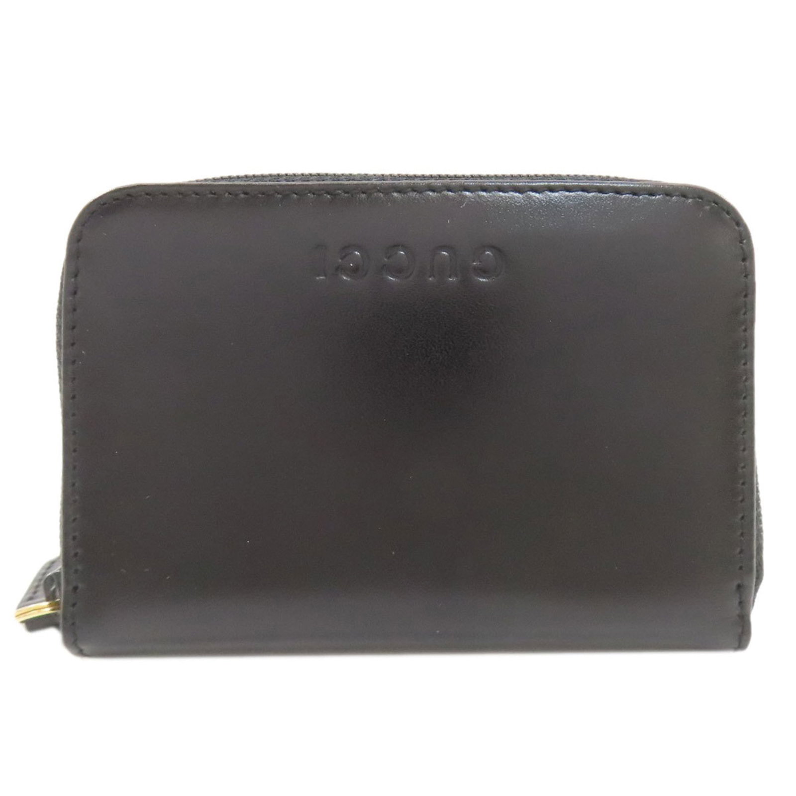 Coin purse leather case Gucci: Coin purse leather case Gucci Black Gucci leather coin purse case with a sleek 7cm x 10.5cm x 1.5cm size. This compact leather case features a classic design and is made from high-quality leather.
