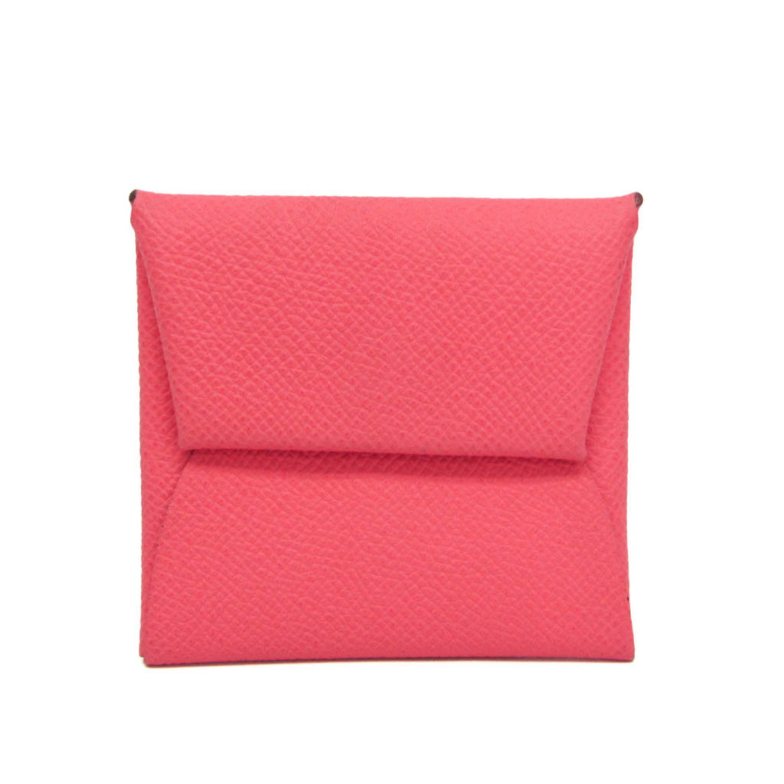 Hermes Coin Purse/ Coin Case Epsom Leather: Hermes Coin Purse/ Coin Case Epsom Leather Epsom leather coin purse from the iconic Hermes Bastia line, crafted in France with a soft pink hue. This compact, snap closure case measures 8cm x 8.5cm and