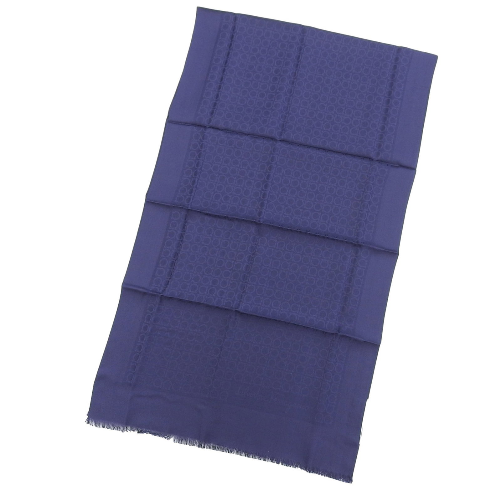 Ferragamo Silk Wool Scarf Salvatore: Ferragamo Silk Wool Scarf Salvatore Silk and wool blend creates a luxurious texture in this navy Ferragamo scarf, measuring 1.6m x 47cm. The Italian design showcases Salvatore Ferragamo's signature st