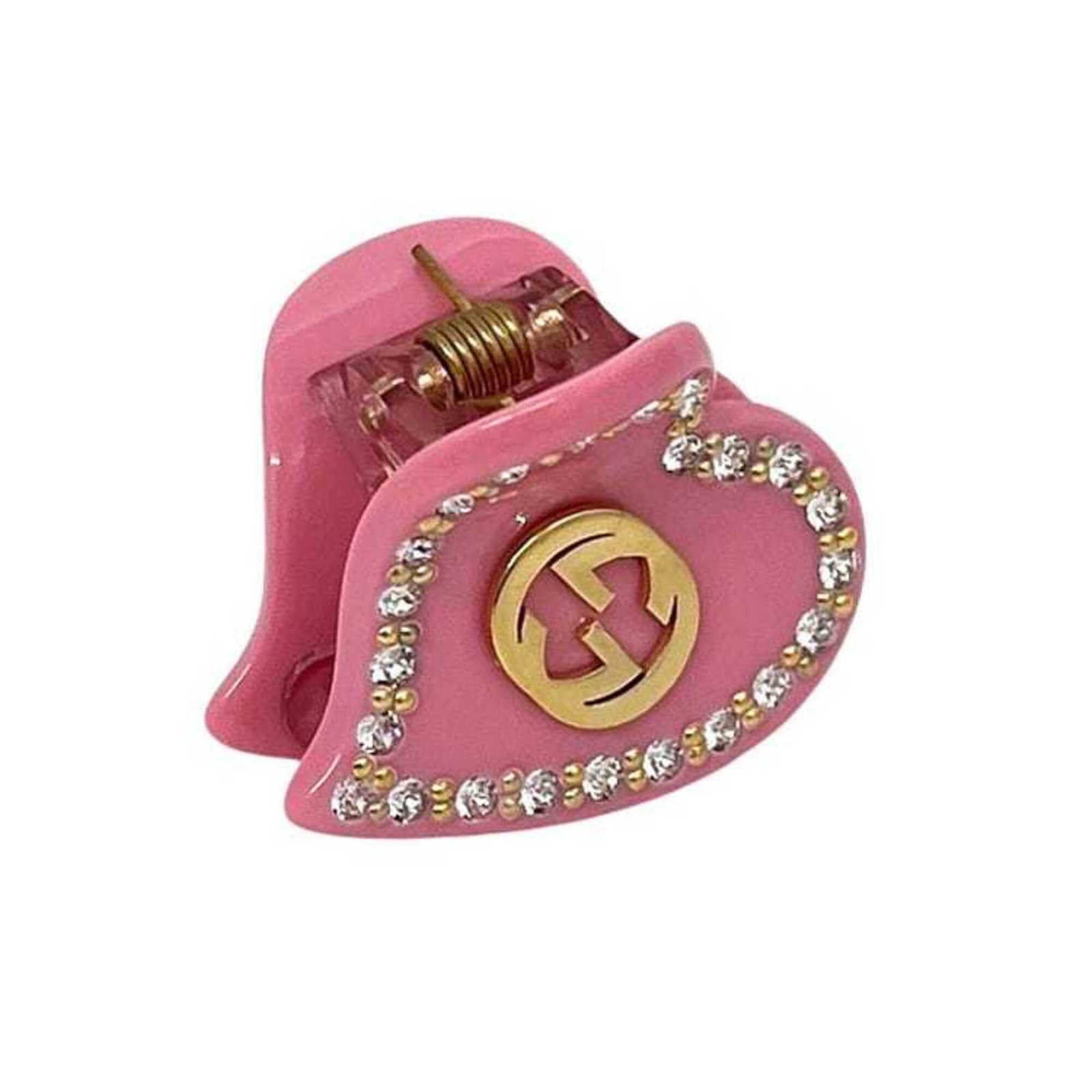 Gucci Hair Clip Plastic: Gucci Hair Clip Plastic This Gucci hair clip is a small, pink plastic accessory measuring 2.9cm x 2.5cm. Made of plastic, it features a distinctive design. The clip is a notable example of Gucci's bra