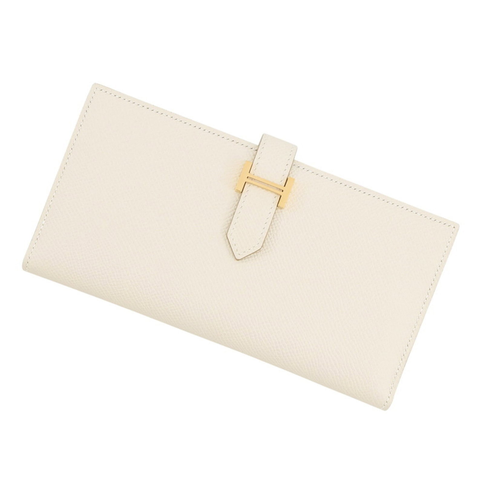 Epsom Leather Bi fold Wallet Hermes: Epsom Leather Bi fold Wallet Hermes Epsom leather, a rich and luxurious material, is used to create this elegant bi-fold wallet from Hermes. Measuring 9cm x 17.5cm, the wallet's classic design is both