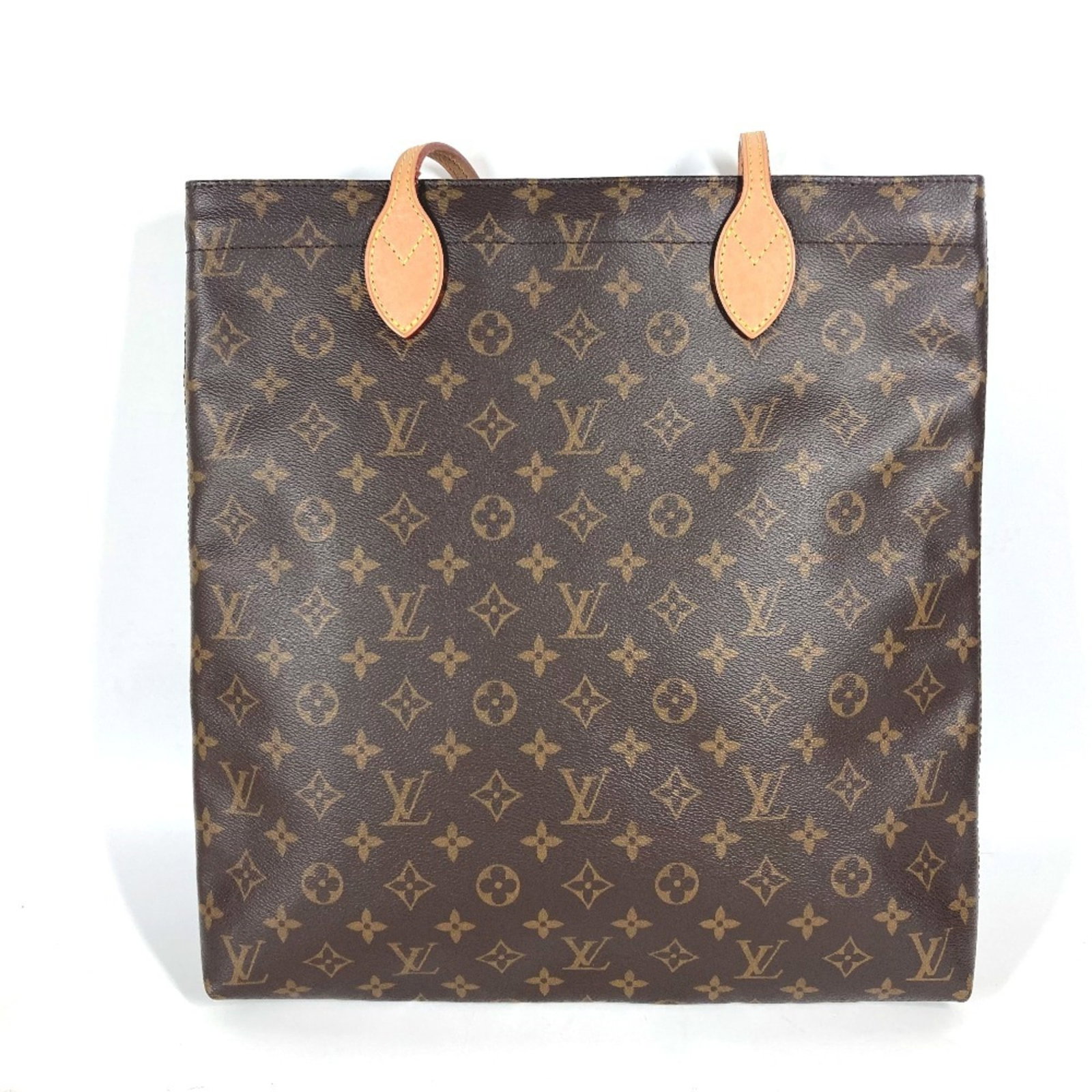 Vuitton Pouch Bag Tote Bag Monogram Louis: Vuitton Pouch Bag Tote Bag Monogram Louis The Louis Vuitton Monogram Pouch Bag Tote Bag features a classic design with a timeless monogram pattern, available in a rich brown color. This stylish tote