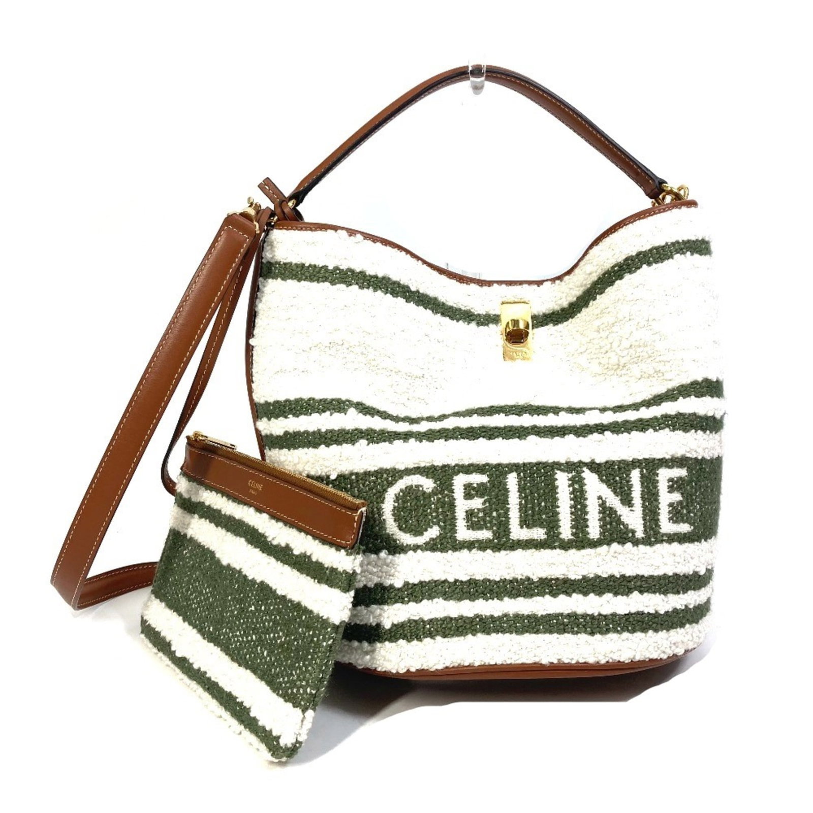 Celine Handbag Leather: Celine Handbag Leather White Celine handbag made from high-quality leather, featuring a classic design with clean lines and a spacious interior. The bag measures 24.5cm x 23cm x 22cm and has a shoulde