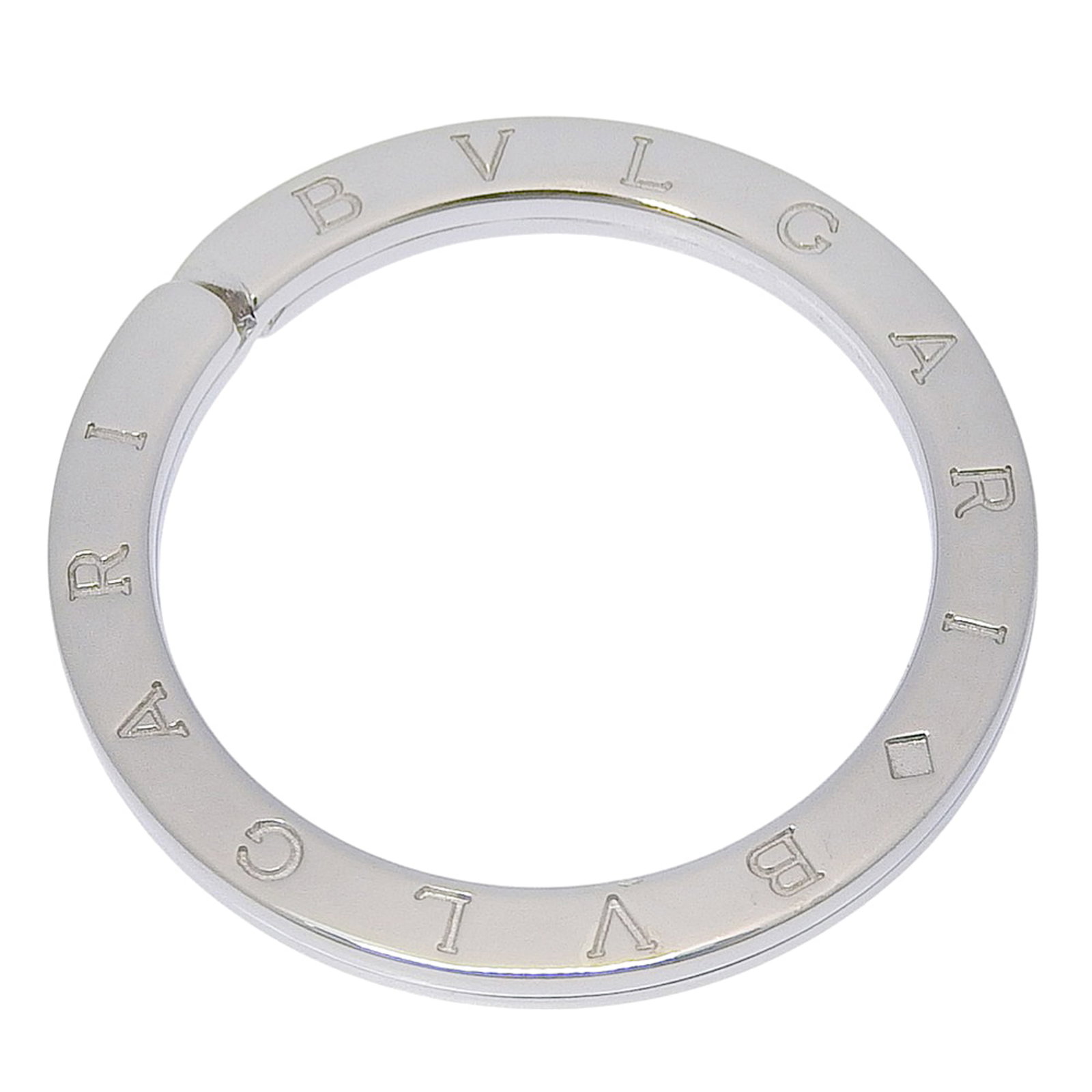 Silver 925 Bvlgari Keyring: Silver 925 Bvlgari Keyring Silver 925 Bvlgari Keyring is a sleek and sophisticated accessory, crafted from high-quality silver 925 material. Its compact size and elegant design make it a versatile