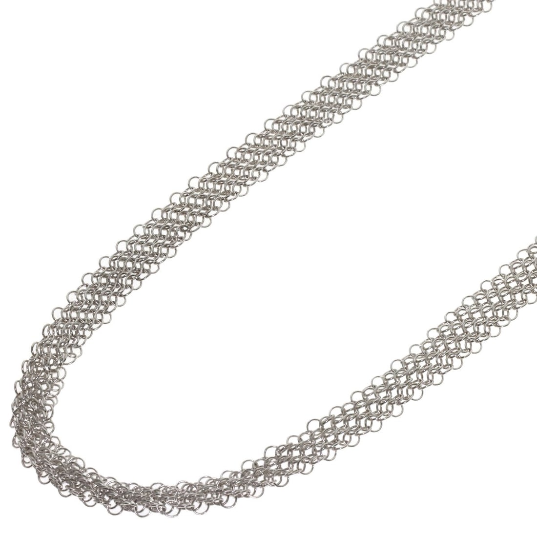 Mesh necklace silver Somerset Tiffany&Co.: Mesh necklace silver Somerset Tiffany&Co. Silver Mesh Necklace from Tiffany&Co. Features a unique mesh design made from high-quality silver metal, adding a touch of modern elegance to any outfit. The 