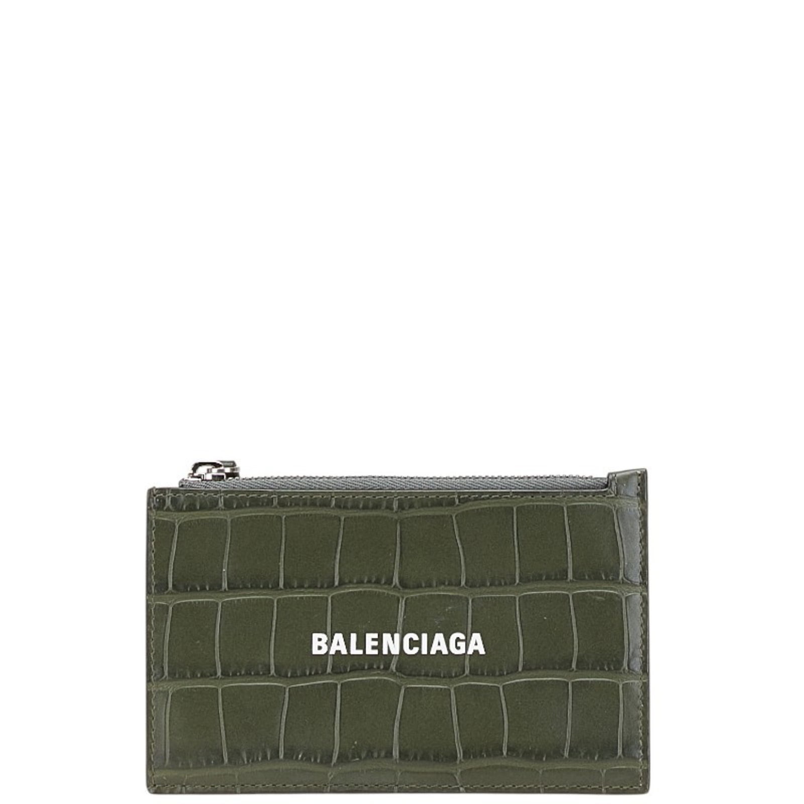 Card case Leather Balenciaga: Card case Leather Balenciaga This khaki leather card case from Balenciaga features a classic design with a sleek, minimalist aesthetic. Made from high-quality leather, its compact size and subtle