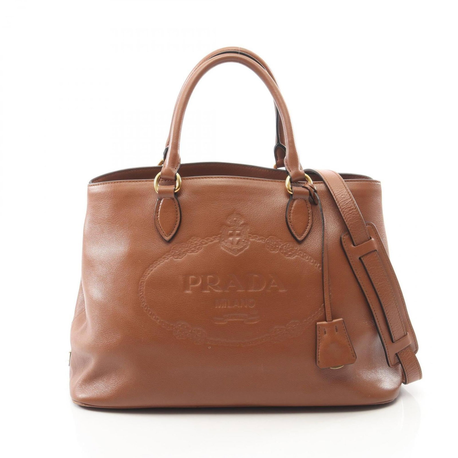 Handbag Leather Prada: Handbag Leather Prada This Prada handbag is made from high-quality leather, featuring a classic brown color and a timeless design. Measuring 24cm x 34cm x 17cm, it has a sleek and compact size that ma