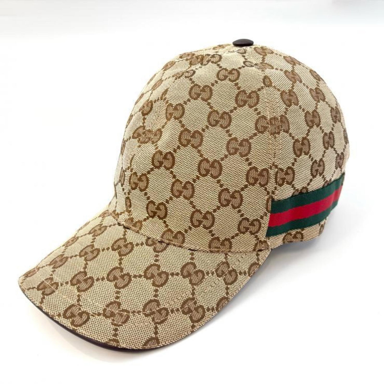 Gucci Cap Polyester Nylon: Gucci Cap Polyester Nylon Brown Gucci Cap Made from Polyester and Nylon. This baseball cap features the Gucci brand and is made from a durable polyester and nylon material. Item Specifics: Brand: