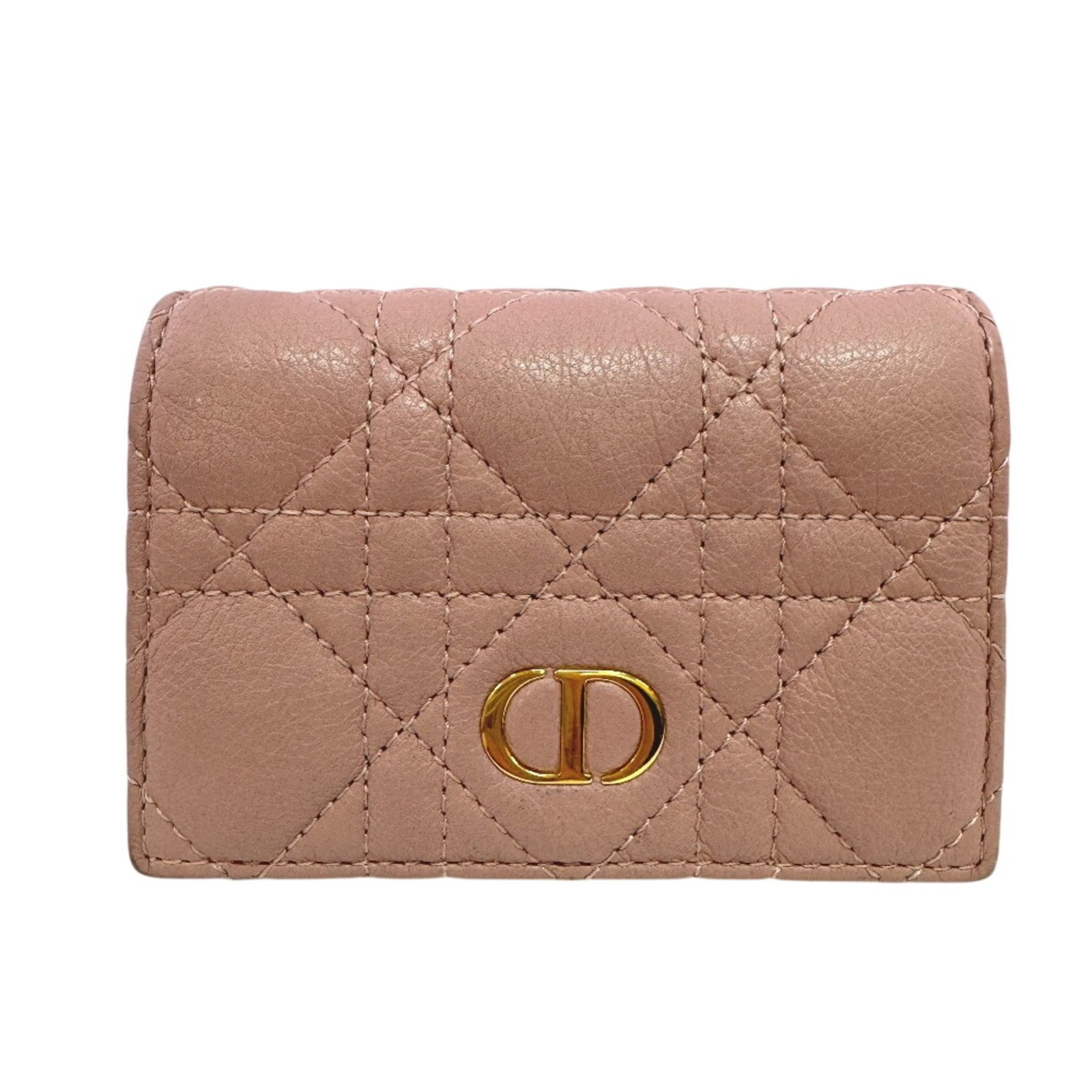 Dior Christian Wallet Leather Bi: Dior Christian Wallet Leather Bi This pink leather bi-fold wallet from Dior Christian features a classic design with a signature touch. Made from high-quality leather, its sleek 8.5cm x 11cm size