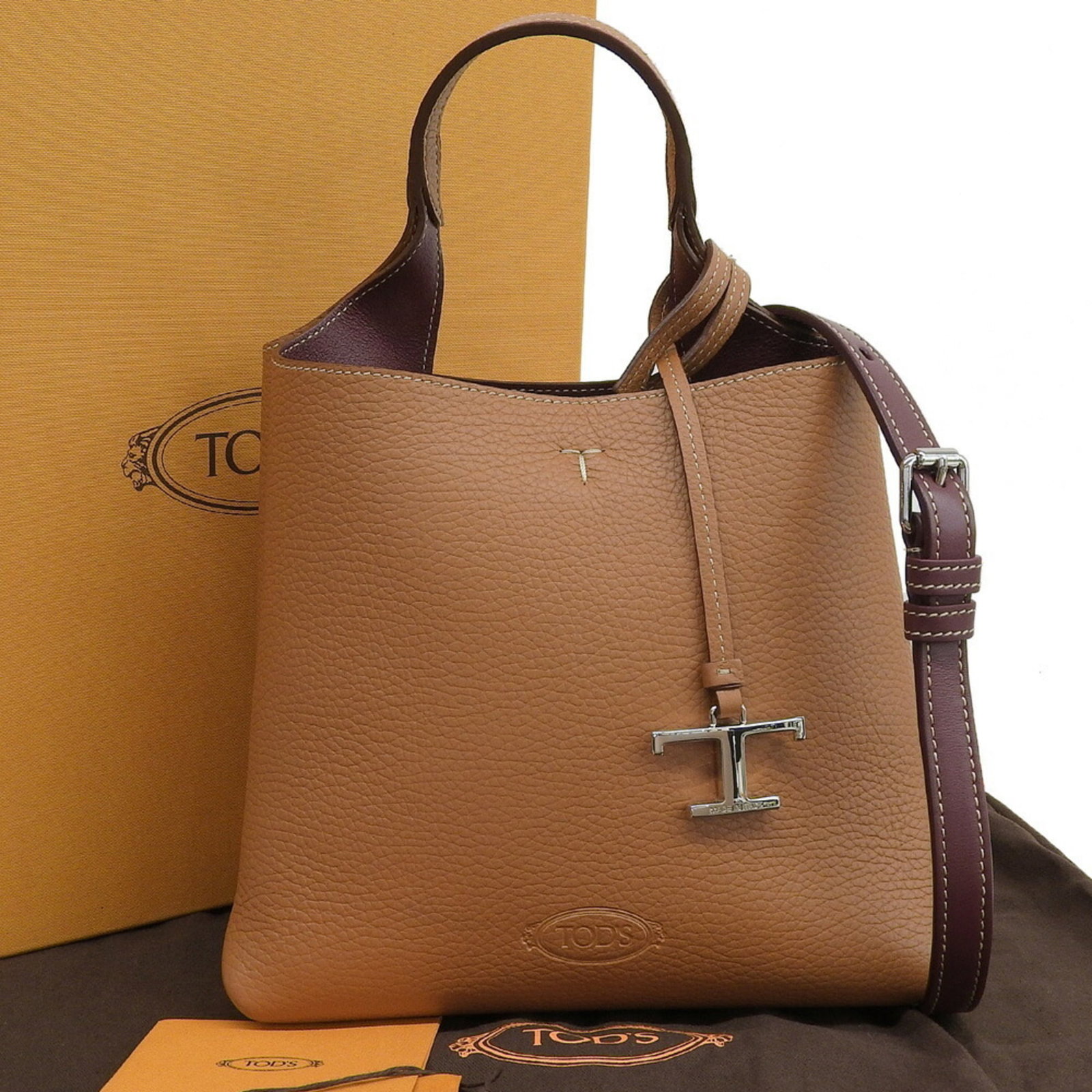 Handbag Leather Tod'S: Handbag Leather Tod'S Tod's MPN XBWAPAA9100QNK9P13 Handbag is a high-quality, brown leather handbag with a size of 18cm x 21cm x 12.5cm, featuring a classic design that exudes timeless elegance. The