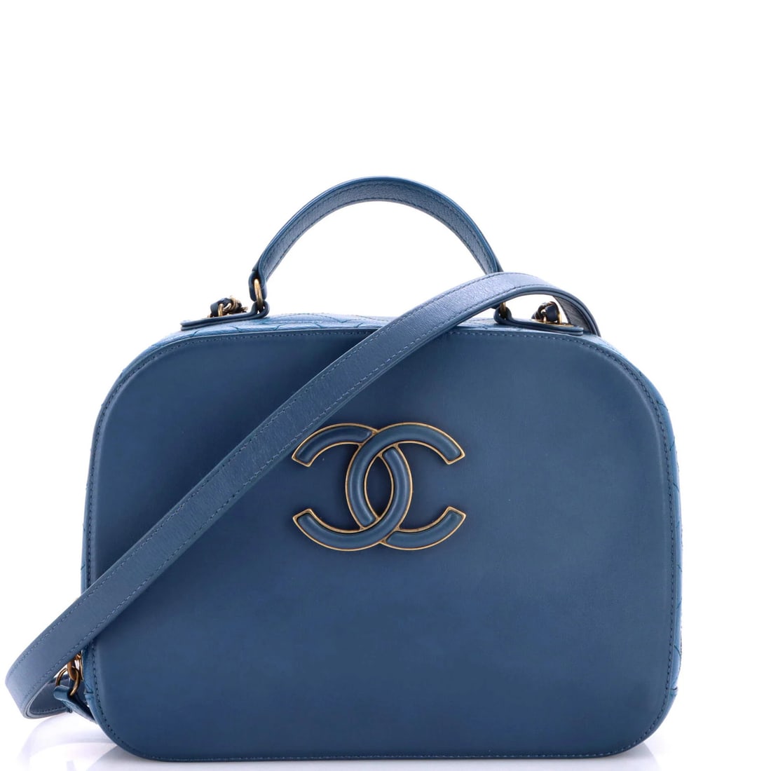 Chanel Coco Curve Vanity Case Calfskin and Quilted Goatskin Medium: Chanel Coco Curve Vanity Case Calfskin and Quilted Goatskin Medium The Chanel Coco Curve Vanity Case in Blue features a sturdy medium size, with a 2.5" handle drop and a 24" strap drop, making it a