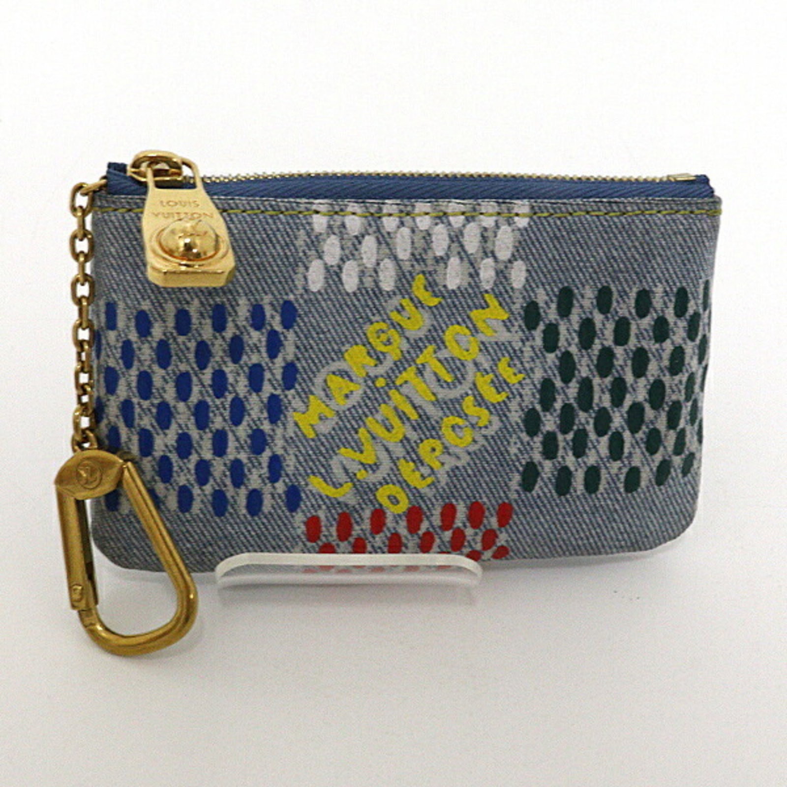 Louis Vuitton Keycase: Louis Vuitton Keycase Blue Louis Vuitton Keycase. Made in France, this compact keycase features a sleek design and a signature from the artist. Measuring 7.5cm x 12cm x 1.2cm, it is a stylish