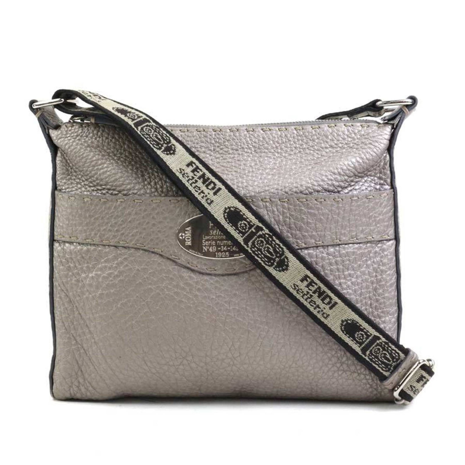 Canvas Leather Shoulder Bag Fendi: Canvas Leather Shoulder Bag Fendi The Fendi Canvas Leather Shoulder Bag boasts a striking metallic gray color and sleek design, featuring a combination of high-quality leather and canvas materials. Me