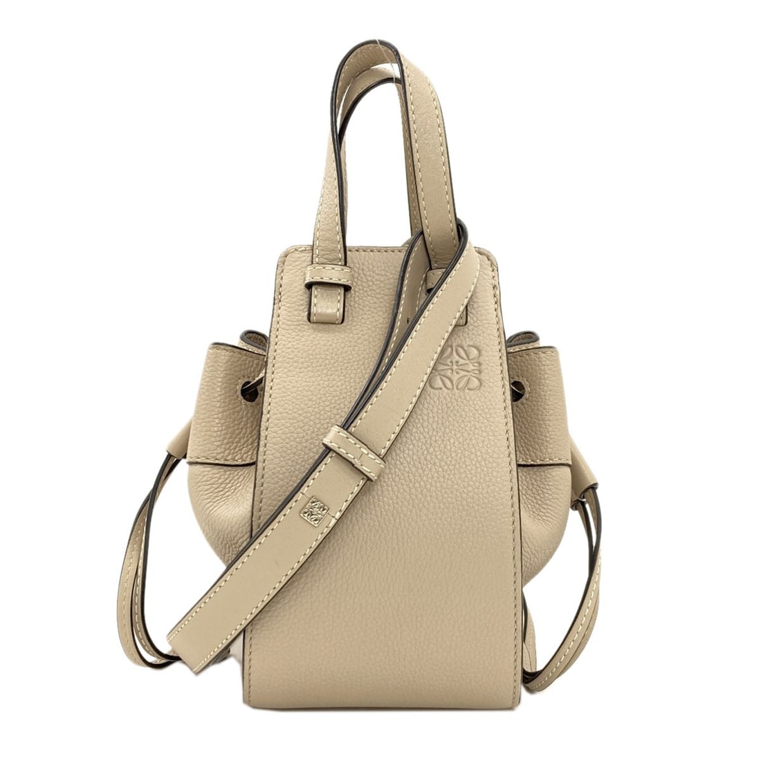 Calf Hammock Mini Handbag 2Way Loewe: Calf Hammock Mini Handbag 2Way Loewe Calf Hammock Mini Handbag 2Way Loewe - A stylish beige calf leather handbag with a classic design, featuring a 2-way closure and a timeless silhouette. Made from
