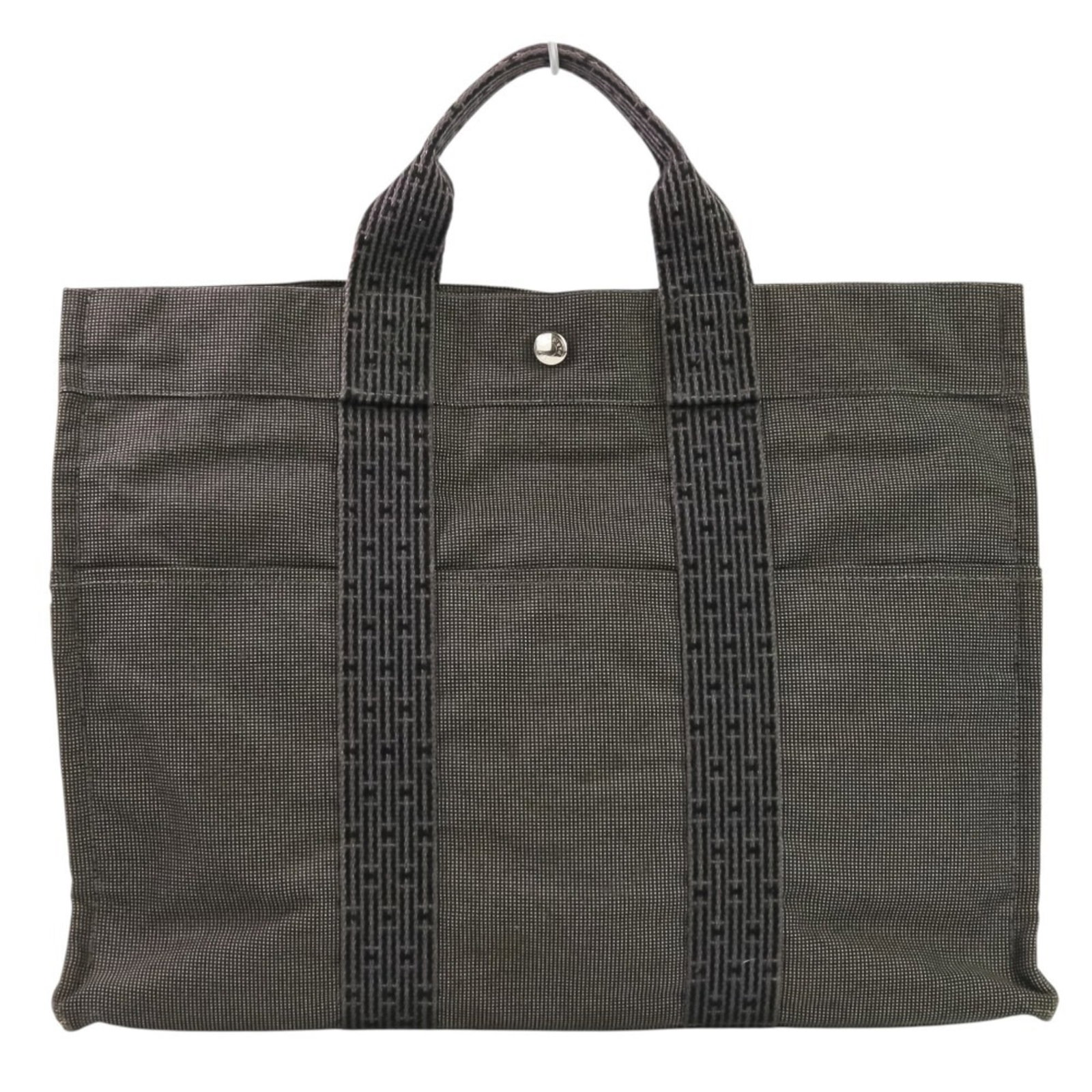 Hermes Tote Bag Polyamide 69% Polyester 31%: Hermes Tote Bag Polyamide 69% Polyester 31% The Herm?s Tote Bag is a versatile and stylish accessory made from a durable polyamide and polyester blend. Measuring 30cm x 43cm x 10.5cm, this compact tot