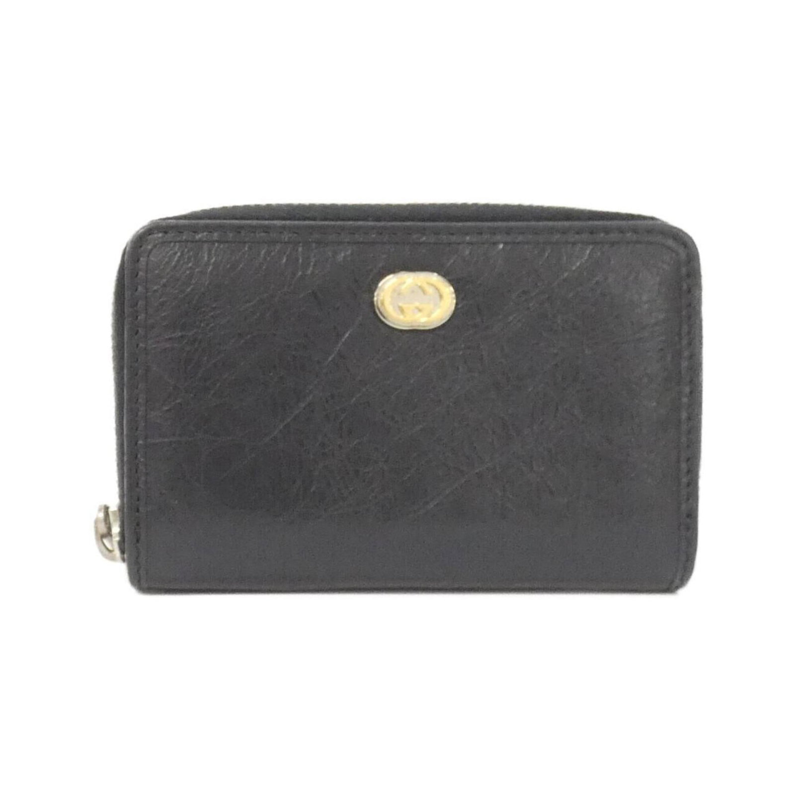 Coin purse leather case Gucci: Coin purse leather case Gucci Leather case from Gucci, a luxury brand, features a sleek black design. Made from high-quality leather, the coin purse measures 8cm x 12cm x 2cm. The signature is
