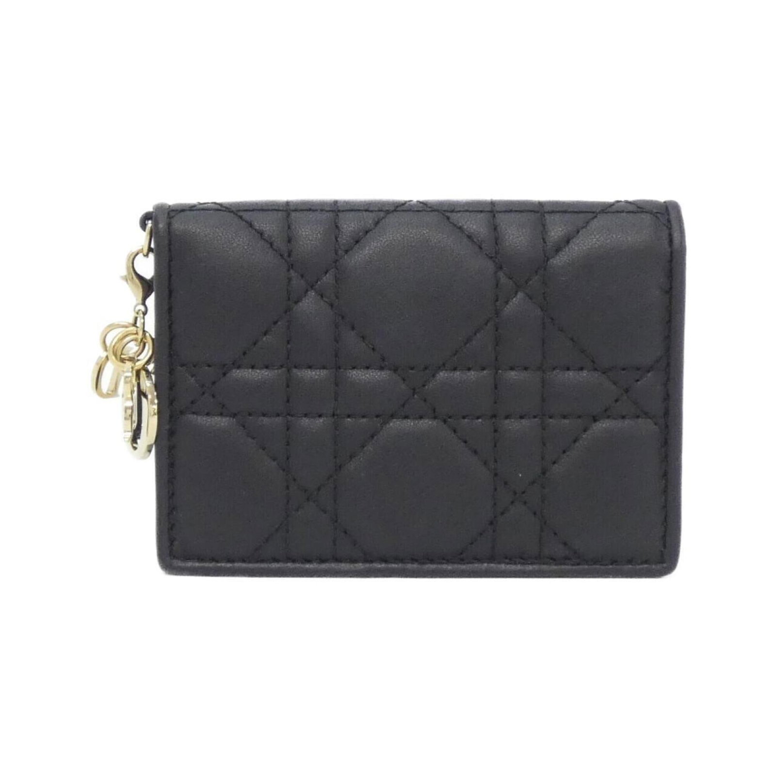 Card Case Leather By Dior: Card Case Leather By Dior Card case by Dior, crafted from black leather, measures 7.5cm x 10.5cm x 2cm. The sleek design makes it a stylish accessory for everyday use. Item Specifics: Brand: Christian