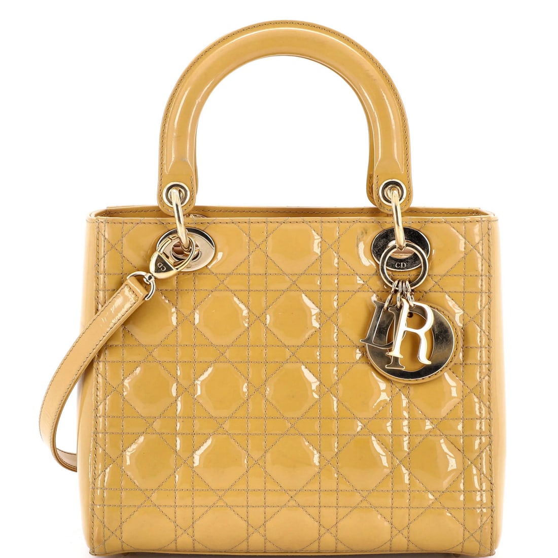 Lady Dior Bag Cannage Medium Patent Quilt Christian: Lady Dior Bag Cannage Medium Patent Quilt Christian Medium Patent Quilt Christian Dior Lady Dior Bag Cannage features a striking gold patent leather exterior with a quilted design, adorned with a