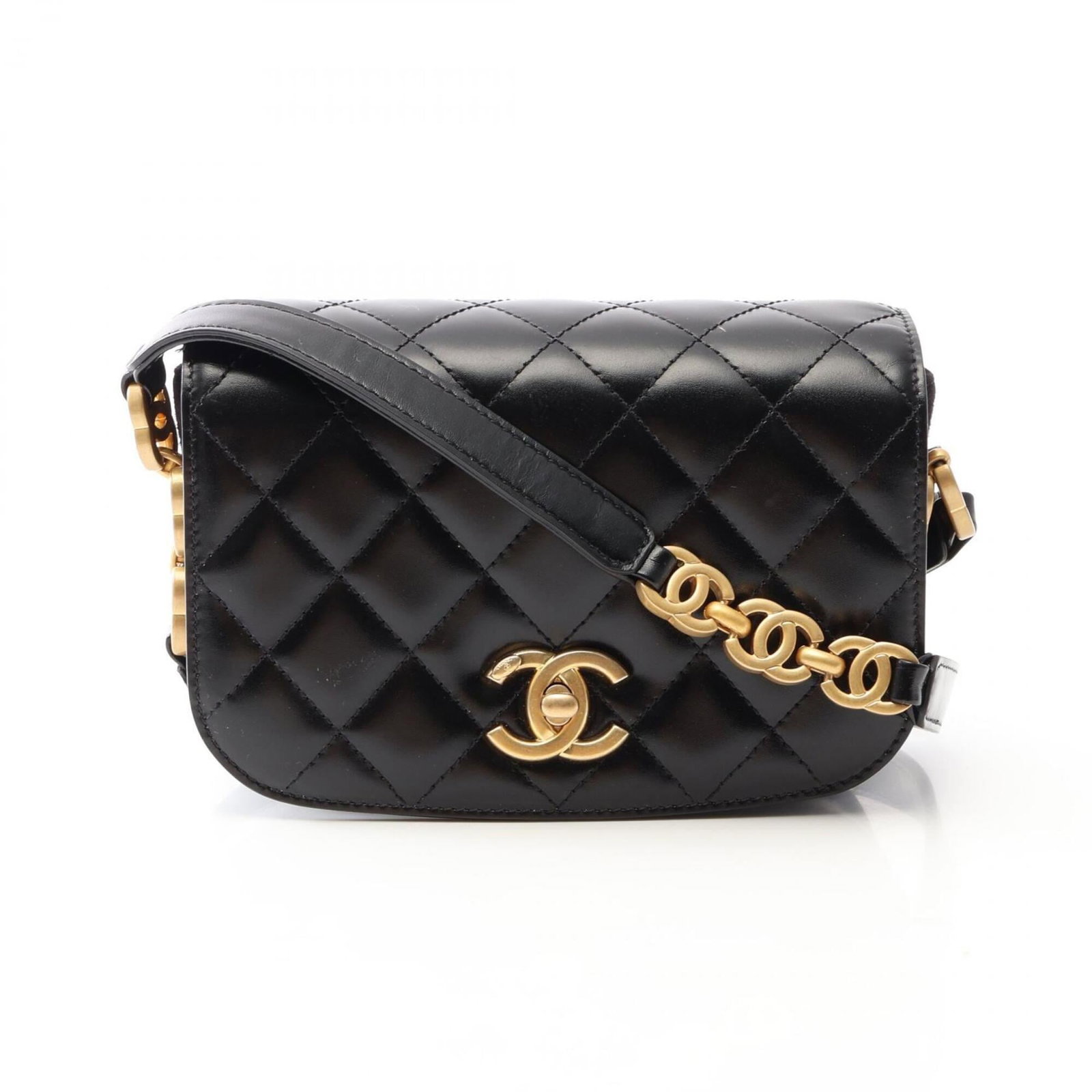 Handbag Leather Suede Shoulder Chanel Bag: Handbag Leather Suede Shoulder Chanel Bag Black leather and suede shoulder bag with gold hardware from Chanel, featuring a compact 12cm x 17.5cm x 3cm size. This stylish shoulder bag is designed for
