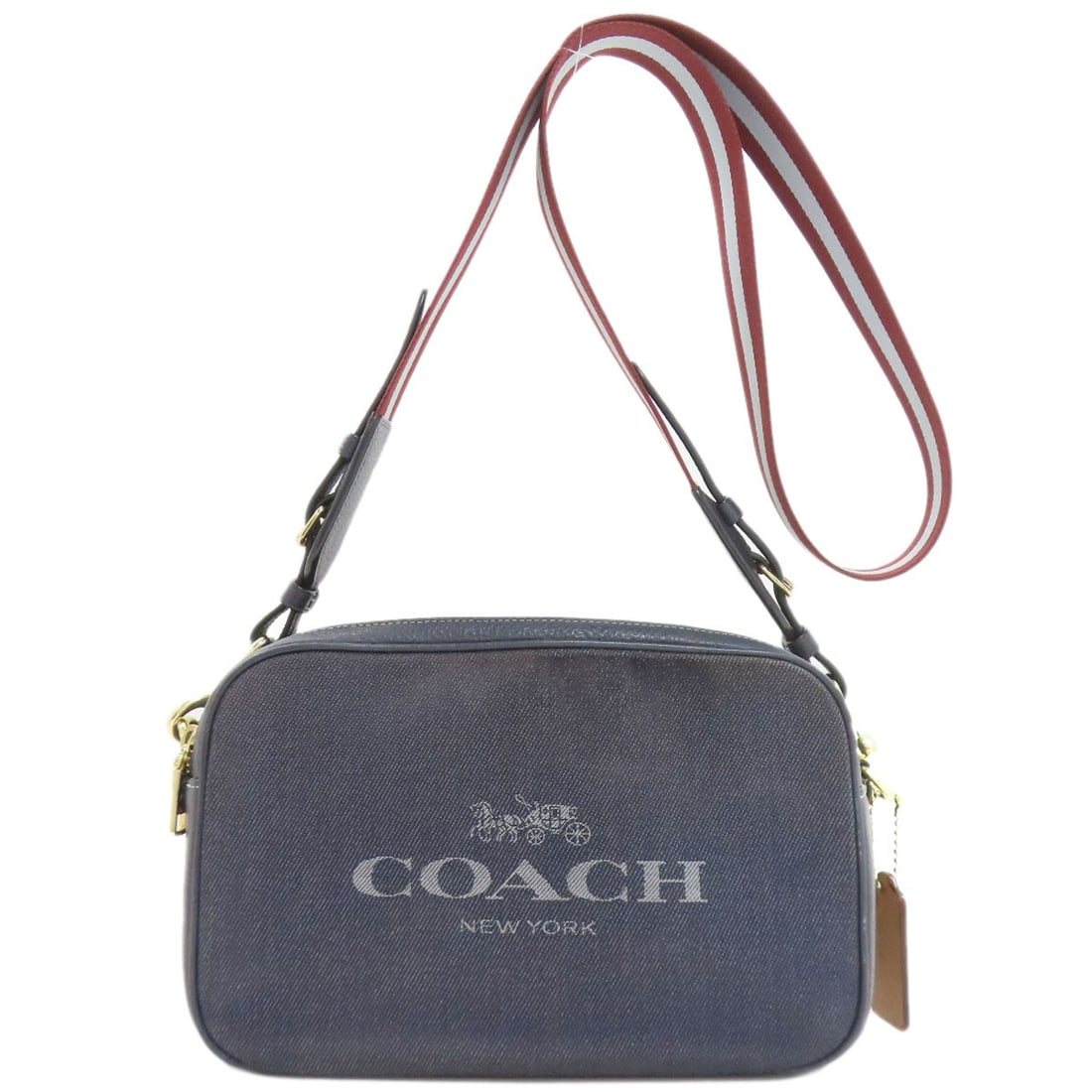 C8585 Logo Coach Denim Bag: C8585 Logo Coach Denim Bag Navy denim exterior gives this COACH shoulder bag a unique touch. The bag's classic design and signature logo make it a stylish addition to any outfit. Item Specifics: