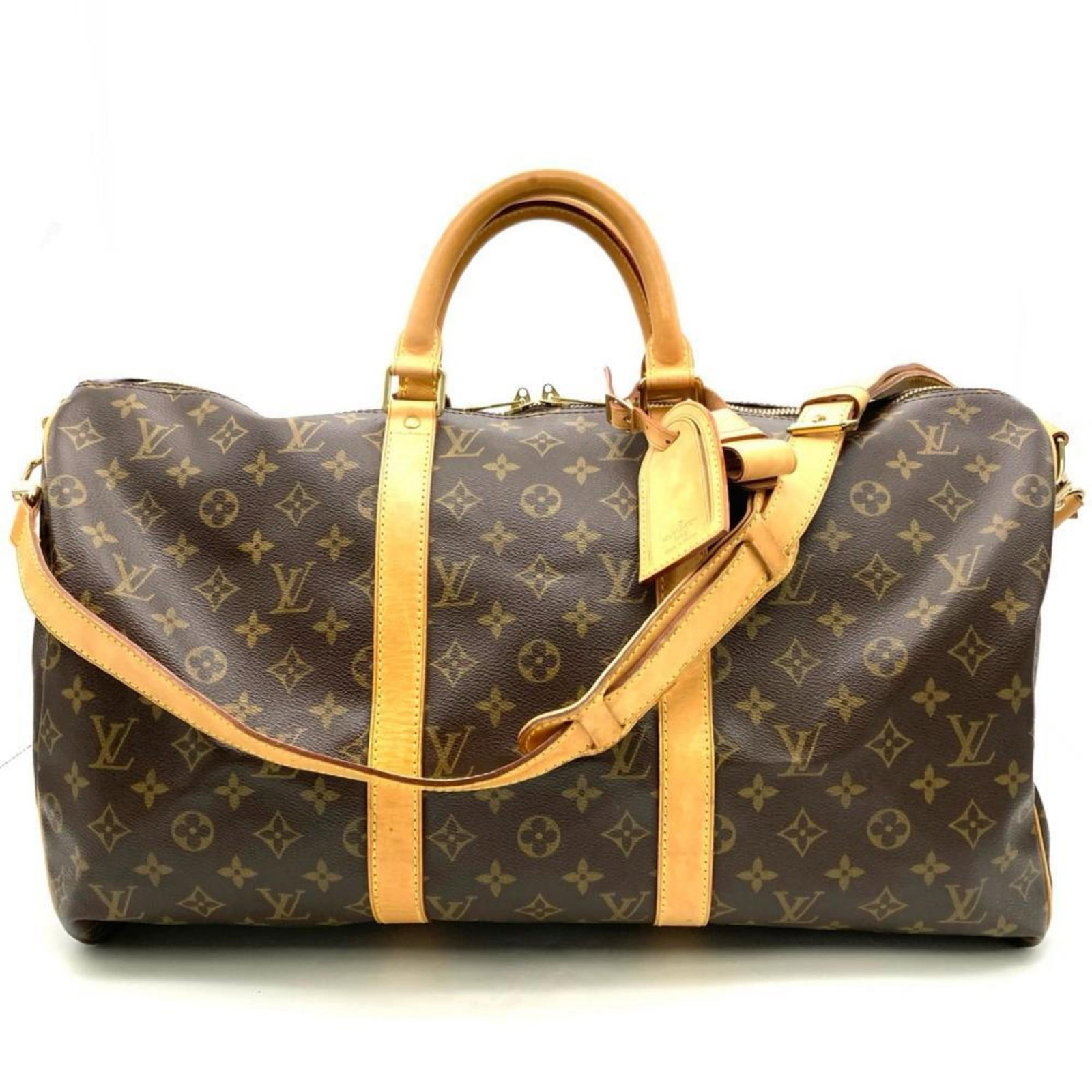 Louis Vuitton Boston Bag Monogram Leather: Louis Vuitton Boston Bag Monogram Leather Brown Monogram Leather Louis Vuitton Boston Bag with Gold Hardware and Zipper Closure. This classic Boston bag features the iconic Monogram pattern and is