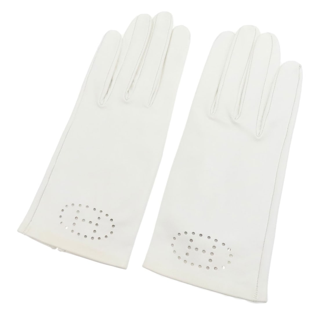 Sheepskin leather glove with Hermes H logo.: Sheepskin leather glove with Hermes H logo. White sheepskin leather glove with the iconic H logo from Hermes. This glove showcases the luxurious feel of high-quality sheepskin and the distinctive bran