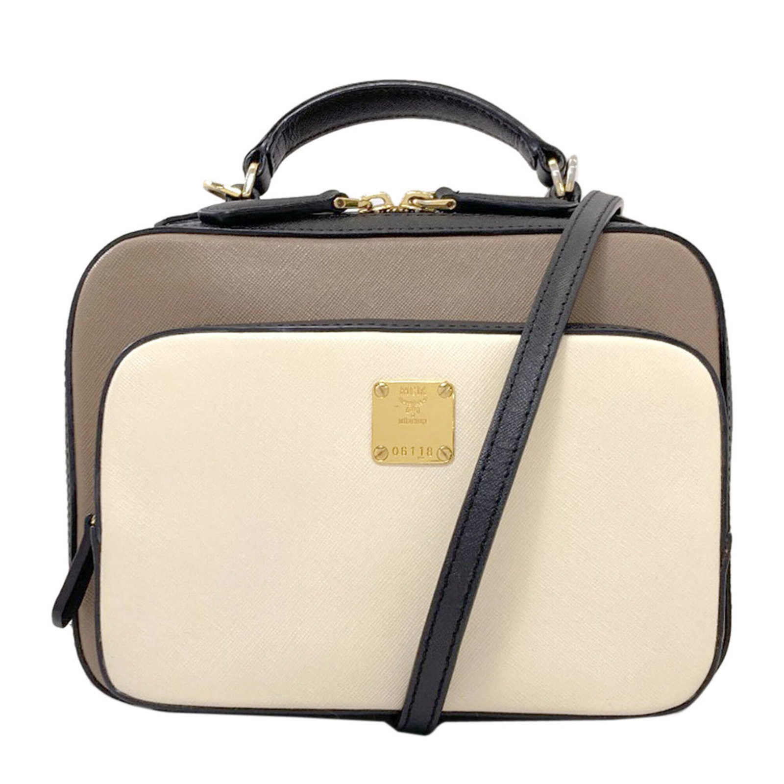 Mcm Handbag Pvc: Mcm Handbag Pvc The MCM Handbag is made from durable PVC material, offering a unique and stylish design. Its compact size, measuring 17cm x 23cm x 7cm, makes it a versatile accessory for everyday