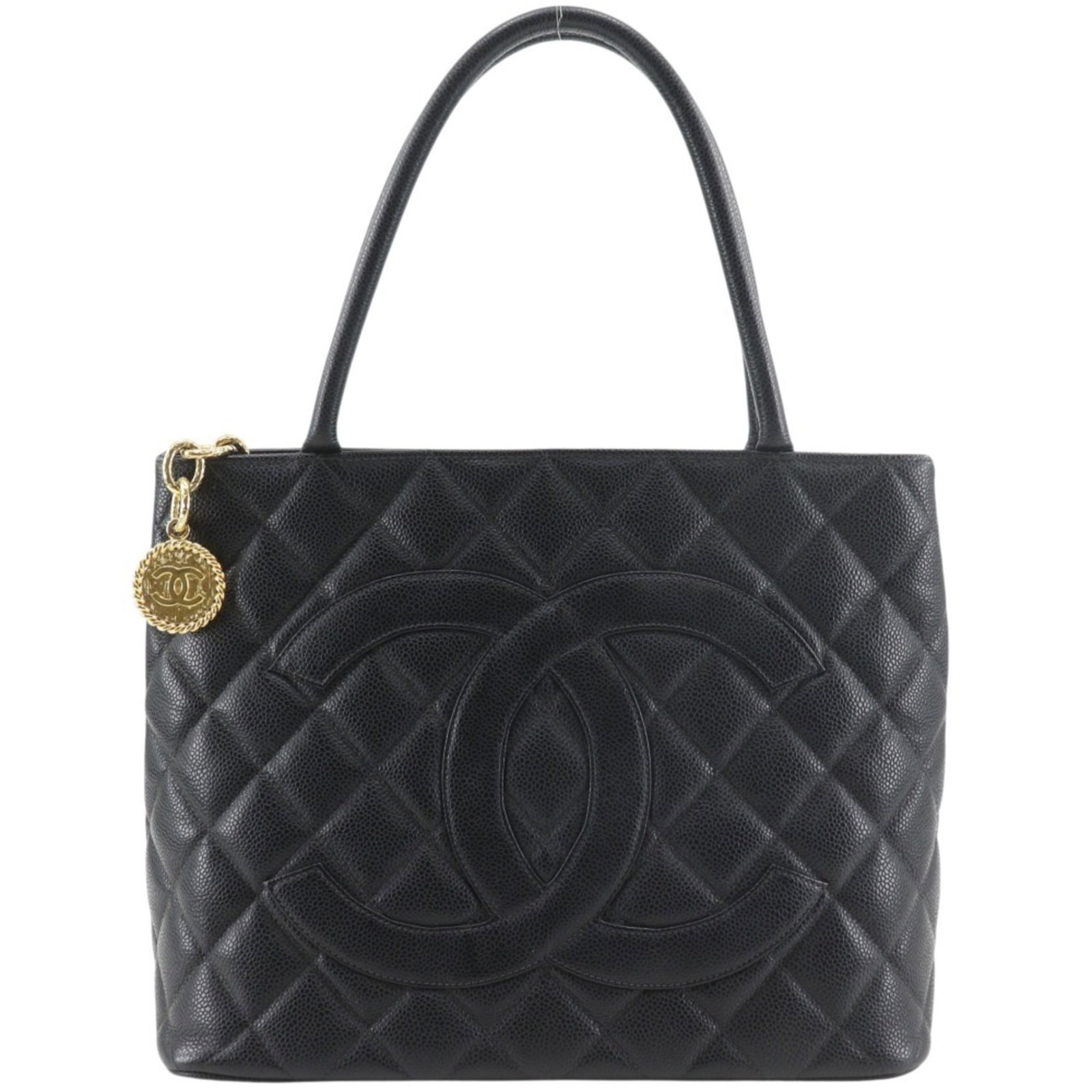 Calfskin Tote Bag Chanel: Calfskin Tote Bag Chanel Calfskin Tote Bag Chanel: A sleek and sophisticated design, this black tote bag features grained calfskin material, measuring 25cm x 30cm x 15cm. The classic Chanel style is