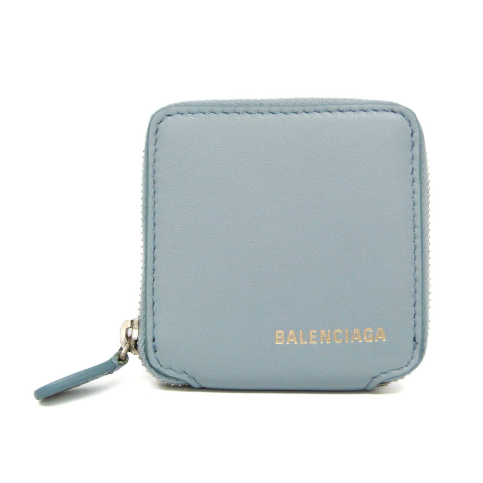 Balenciaga Coin Purse/ Coin Case Leather: Balenciaga Coin Purse/ Coin Case Leather Balenciaga's Ville coin purse boasts a sleek, light blue leather design with a convenient zipper closure. Measuring 8cm x 7.5cm x 1.5cm, this compact coin case