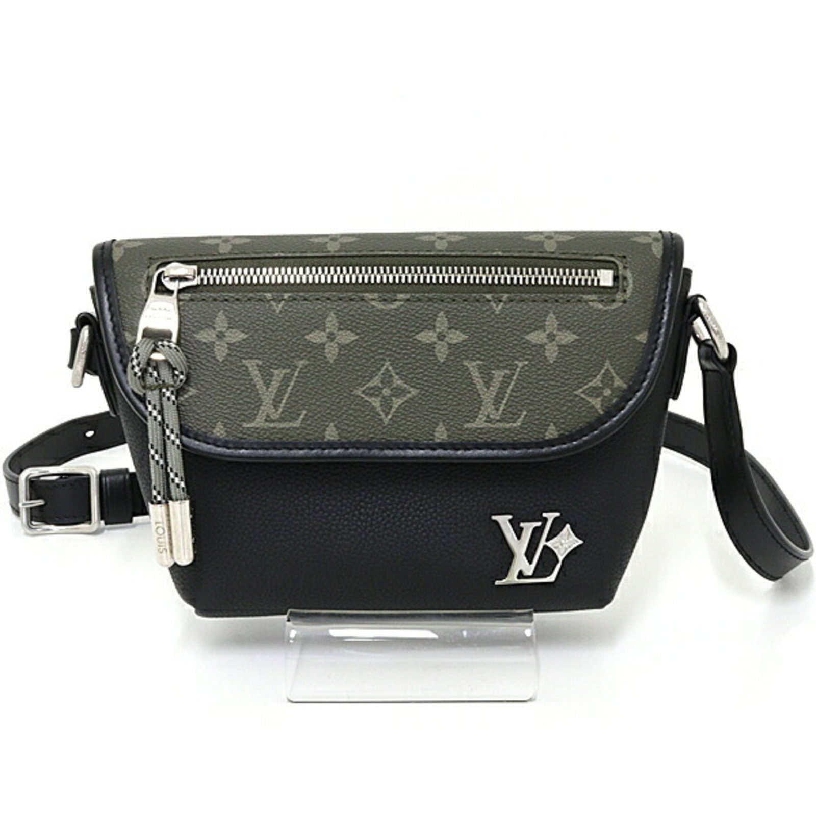 Louis Vuitton Monogram Leather Shoulder Bag: Louis Vuitton Monogram Leather Shoulder Bag The Louis Vuitton Monogram Leather Shoulder Bag is a timeless piece featuring the iconic monogram pattern in black and silver hardware. With its sleek desig