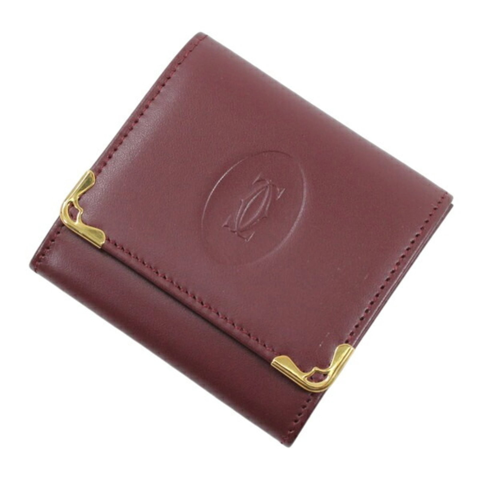 Coin Case Leather Purse Cartier: Coin Case Leather Purse Cartier Cartier's Coin Case Leather Purse is a stylish accessory made from high-quality Calfskin leather, available in the rich Bordeaux color. This compact purse measures 7.5c