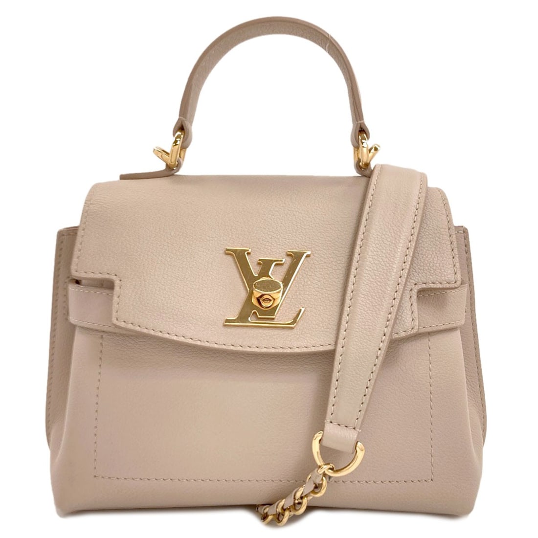Louis Vuitton M21052 Lock Me Ever Mini Handbag Calf: Louis Vuitton M21052 Lock Me Ever Mini Handbag Calf Beige calf leather wraps around the body of this Louis Vuitton Lock Me Ever Mini Handbag, a compact and stylish accessory. The exterior features a