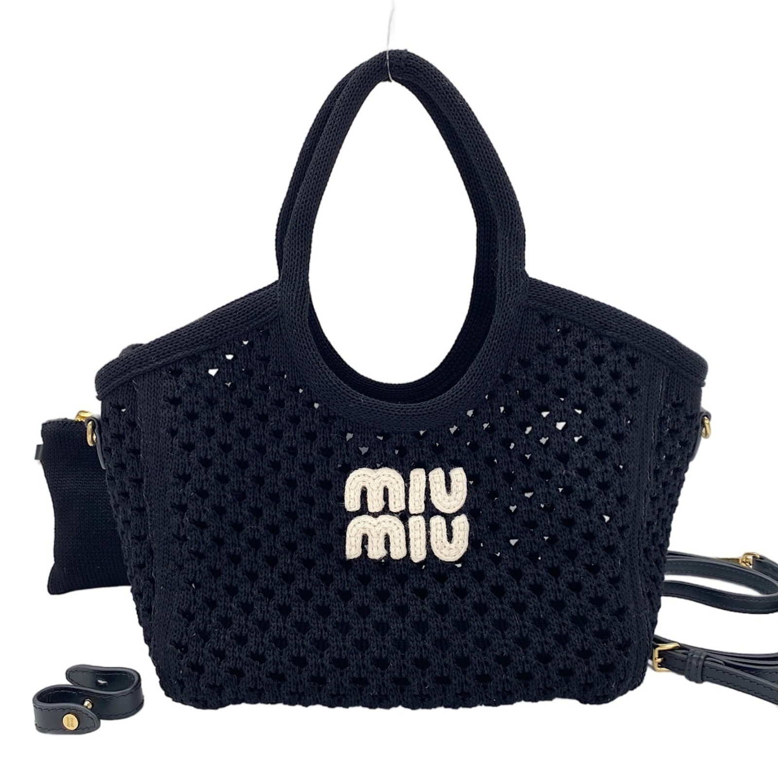 Mesh Miu Handbag: Mesh Miu Handbag Mesh Miu Handbag, a sleek and modern design featuring a mesh material and a black color. Measuring 20cm x 23cm x 14cm, this compact handbag has a strap length of 120.5cm and a handle