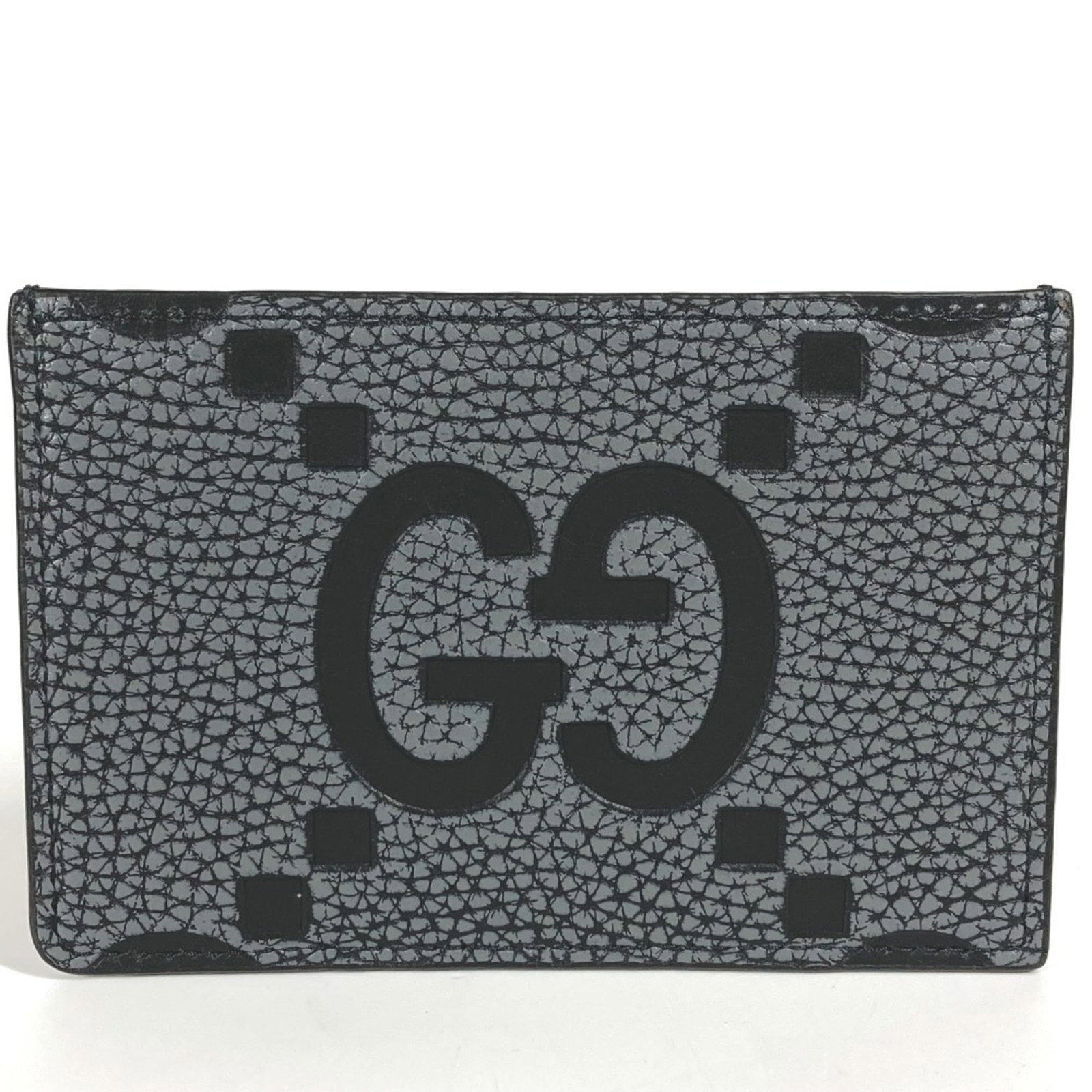 Case Card Leather Gucci: Case Card Leather Gucci This Gucci card case is made from high-quality calfskin leather, featuring a sleek black and gray design. Measuring 8cm x 12cm, it has a classic and sophisticated look that