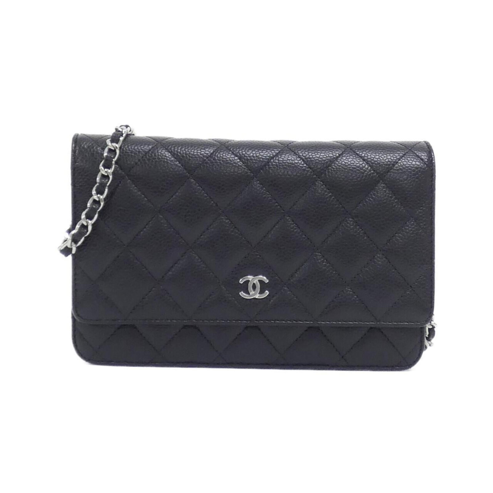 Chanel Chain/ Shoulder Wallet Grained Calfskin: Chanel Chain/ Shoulder Wallet Grained Calfskin Chain/Shoulder wallet in black grained calfskin, measuring 12cm x 19cm x 4cm. This Chanel design combines sleek functionality with classic style,