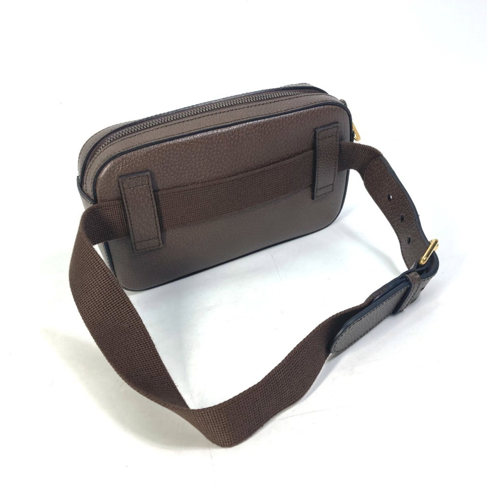 Gucci Sling Bag Leather Fanny Pack: Gucci Sling Bag Leather Fanny Pack The Gucci Sling Bag Leather Fanny Pack is a stylish accessory made from high-quality leather, available in a rich brown color. Measuring 14cm x 23.5cm x 5cm, it