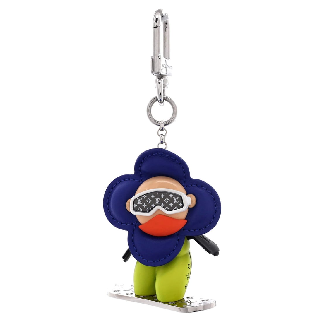 Vivienne Skateboarder Bag Charm Holder Key Louis Resin Wood Vuitton: Vivienne Skateboarder Bag Charm Holder Key Louis Resin Wood Vuitton The Vivienne Skateboarder Bag Charm and Key Holder is a unique blend of resin and wood, featuring a striking blue exterior and a con