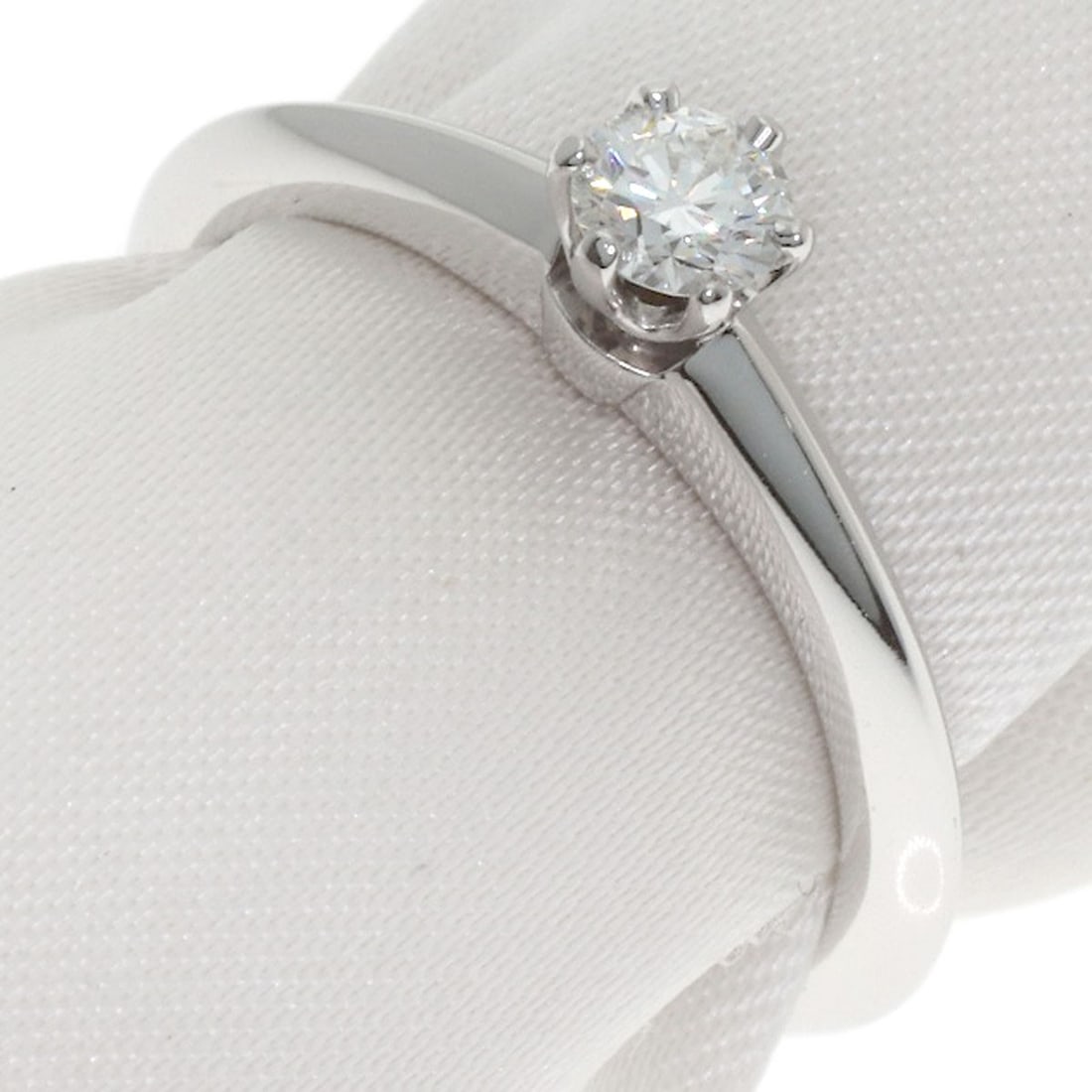 Tiffany&Co Platinum Solitaire Diamond Ring: Tiffany&Co Platinum Solitaire Diamond Ring Platinum Solitaire Diamond Ring from Tiffany&Co. stands out with its sleek silver PT950 metal and stunning D color diamond, weighing 0.19ct. This elegant