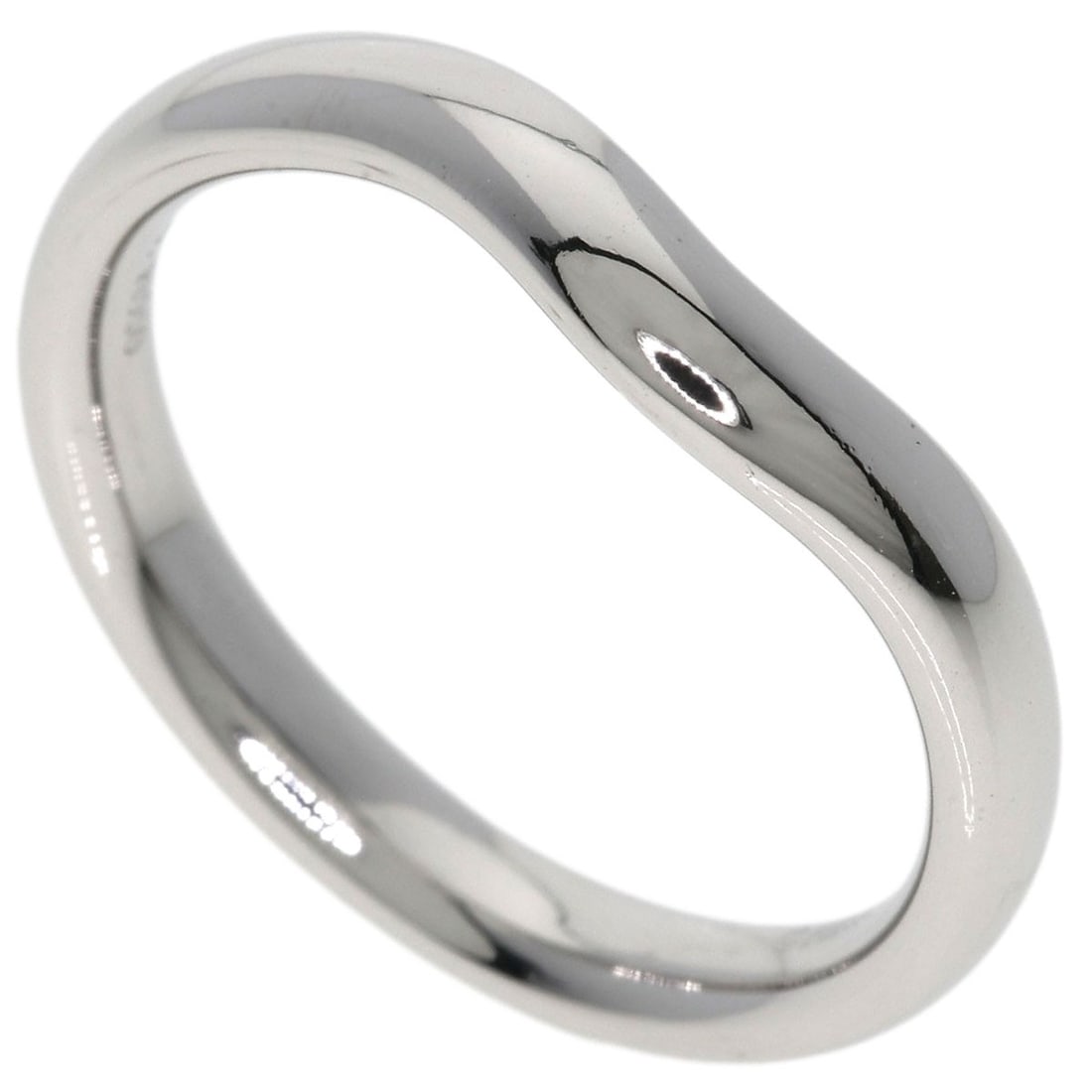 Tiffany Co Platinum Ring Band Curved: Tiffany Co Platinum Ring Band Curved Platinum ring band with a curved design, crafted by Tiffany & Co. in 950 platinum. This silver-toned ring features no main stone and is available in size 7(US). It