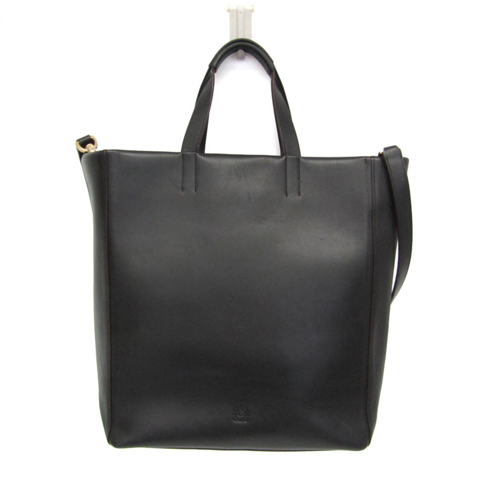 Shoulder Bag Leather Tote Loewe: Shoulder Bag Leather Tote Loewe Black leather shoulder bag with a flap closure and zipper pocket, measuring 31cm x 27cm x 14cm, features a 75cm - 88cm adjustable strap and weighs 860g. The bag's top