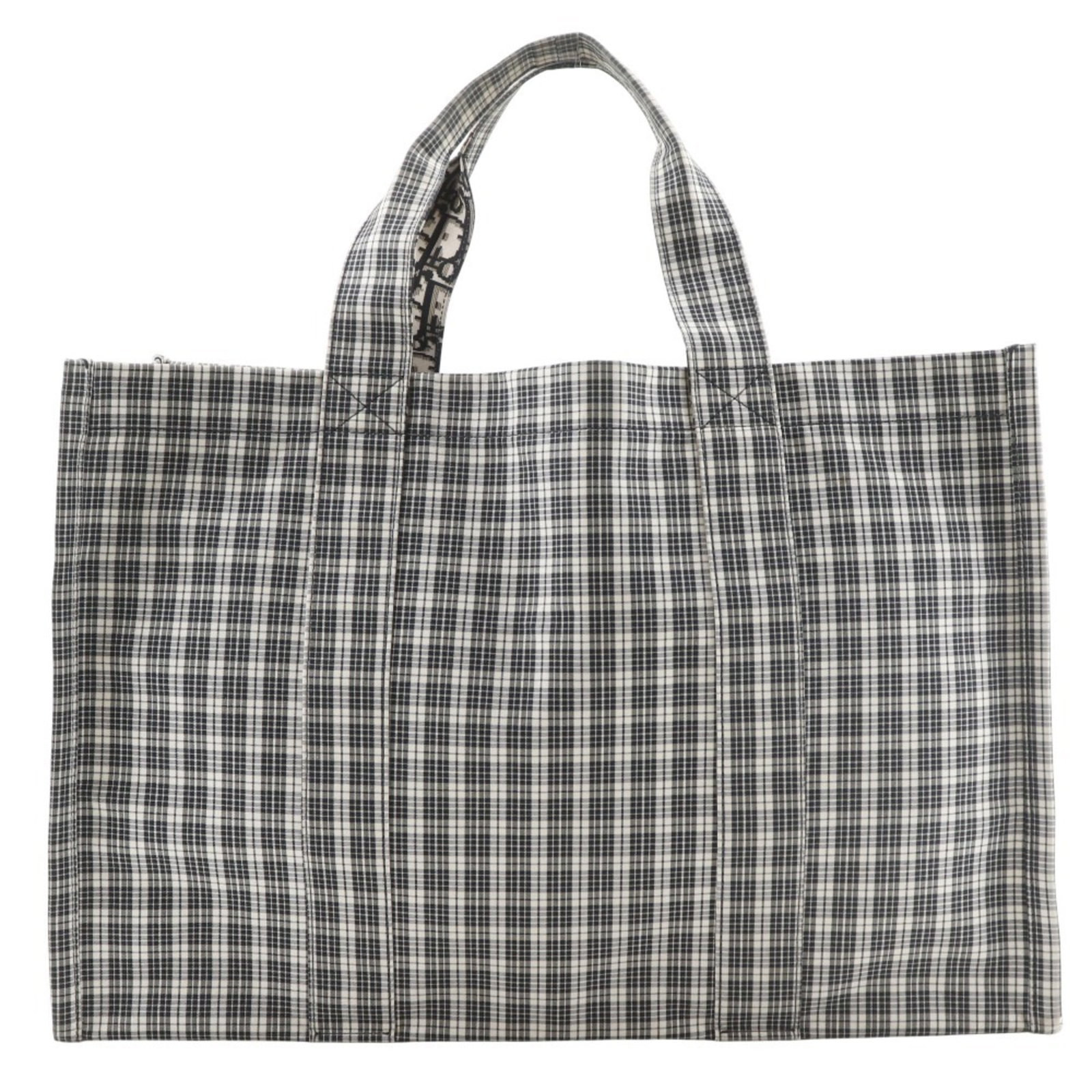 Cotton Christian Dior Tote Bag Handbag: Cotton Christian Dior Tote Bag Handbag Black and white striped cotton tote bag from Christian Dior, measuring 30cm x 45cm x 17cm. This classic tote features a timeless design and a durable cotton