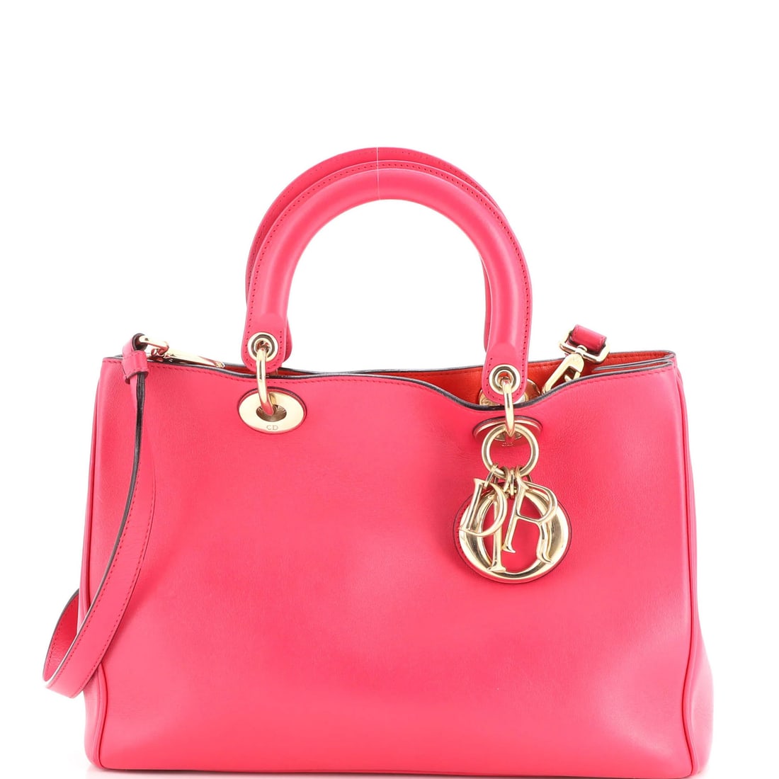 Smooth Calfskin Tote Medium Christian Dior Diorissimo: Smooth Calfskin Tote Medium Christian Dior Diorissimo Smooth Calfskin Tote Medium Christian Dior Diorissimo features a sleek pink exterior with a medium size, 9" height, and 12.5" width, making it a
