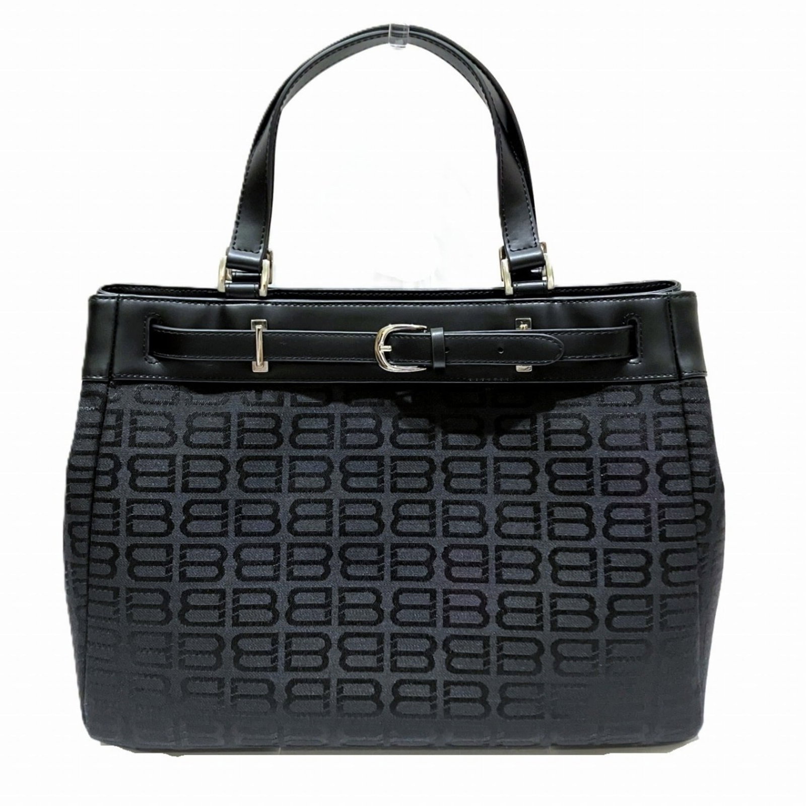 Tote Bag Canvas Leather Balenciaga: Tote Bag Canvas Leather Balenciaga Canvas and leather combine in a sleek, black Balenciaga tote bag, measuring 26cm x 34cm x 12cm. The bag's 35cm handle length provides a comfortable carry. A notable
