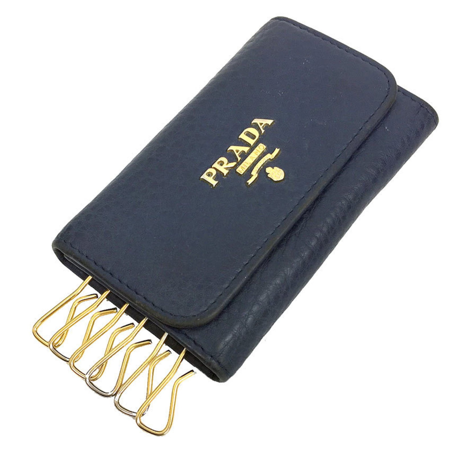 Keycase Leather by Prada: Keycase Leather by Prada Navy Keycase Leather by Prada, a sleek and sophisticated accessory, features high-quality leather construction and comes with a box and guarantee card for added convenience.