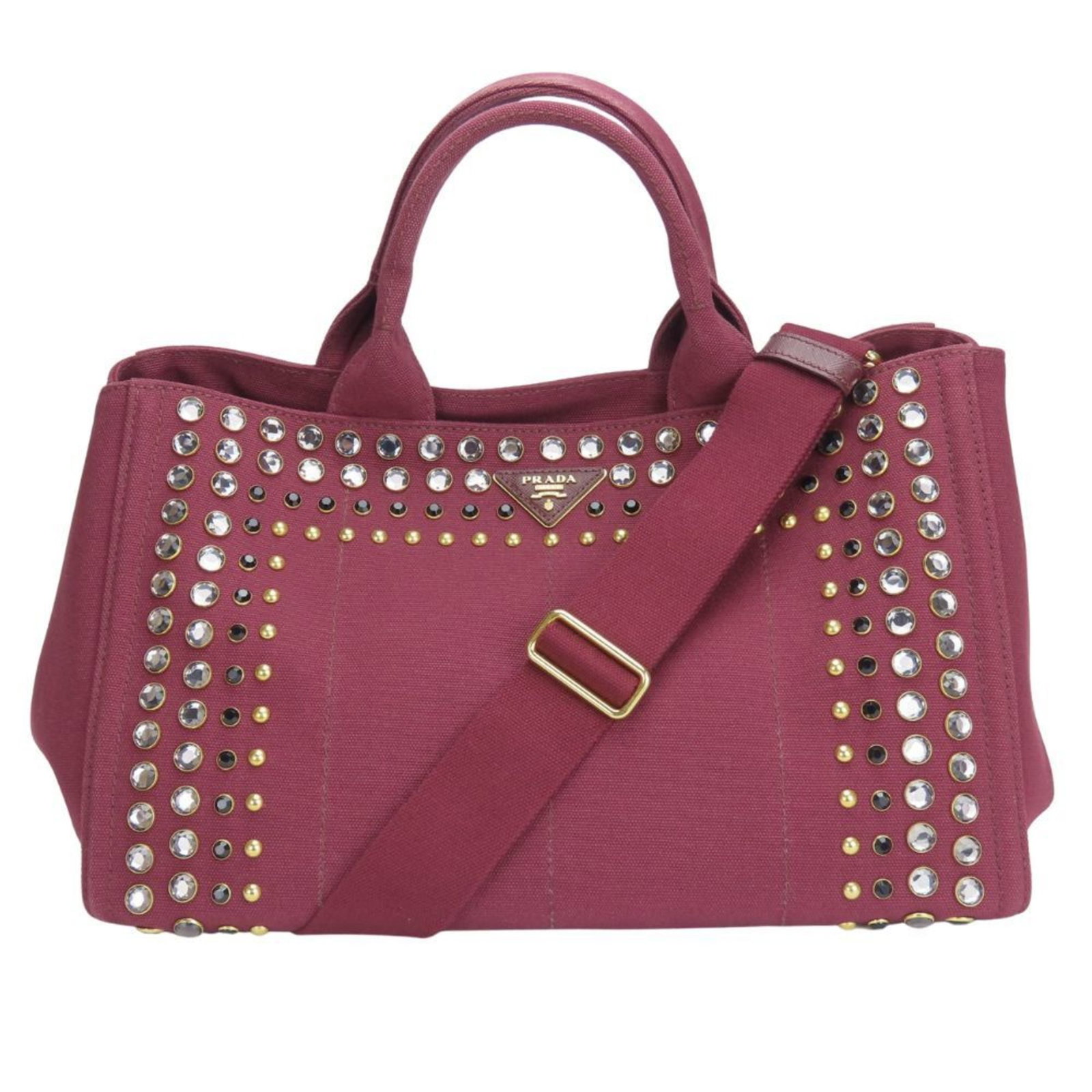 Canvas Prada Tote: Canvas Prada Tote Canvas Prada Tote - A Timeless Wine-Colored Classic. This Prada tote bag is crafted from high-quality canvas, featuring a sophisticated wine color that adds a touch of elegance to an
