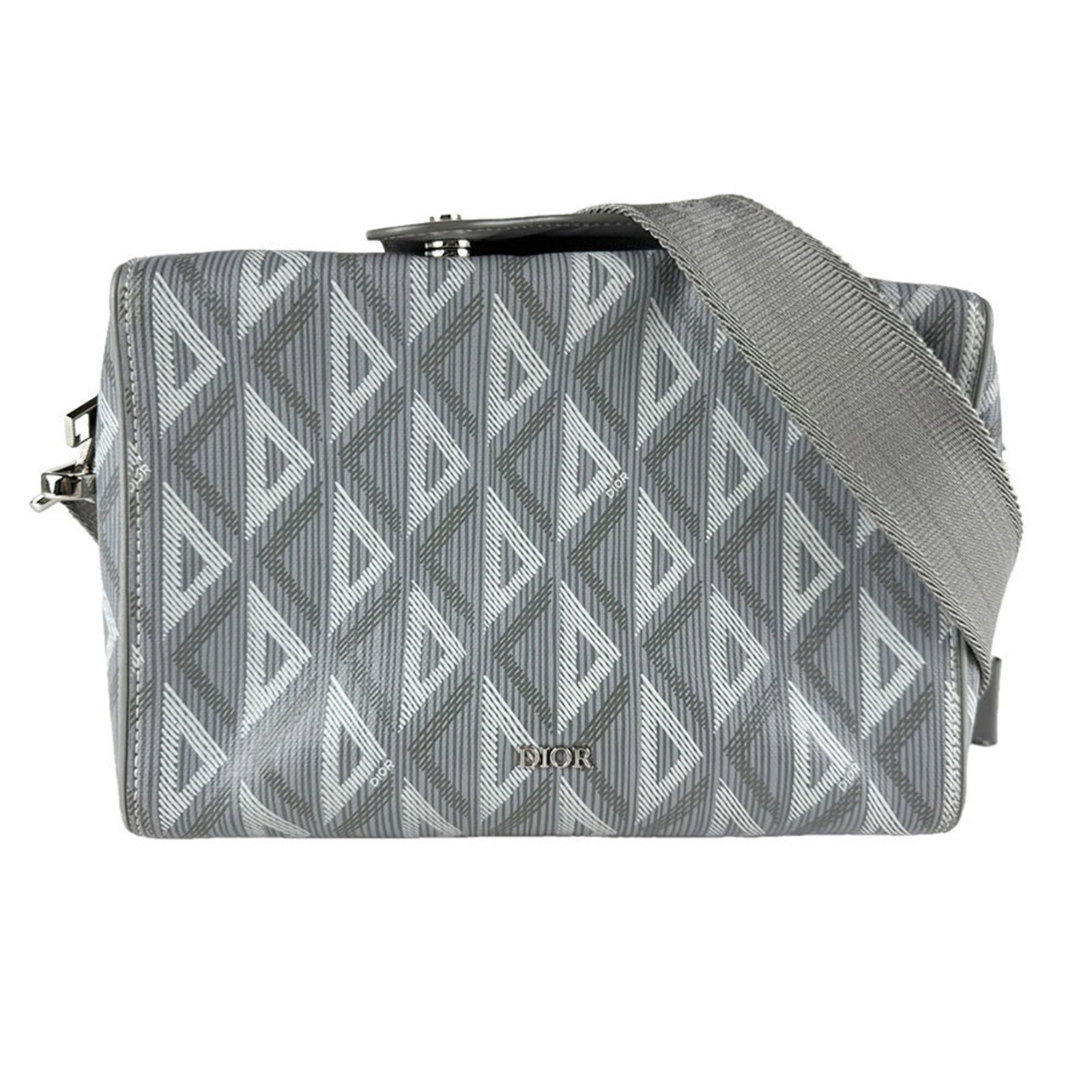 Pvc Leather Shoulder Bag Christian Dior: Pvc Leather Shoulder Bag Christian Dior PVC and leather combine in a sleek, modern design from Christian Dior, a renowned Italian fashion brand. This shoulder bag features a distinctive gray color