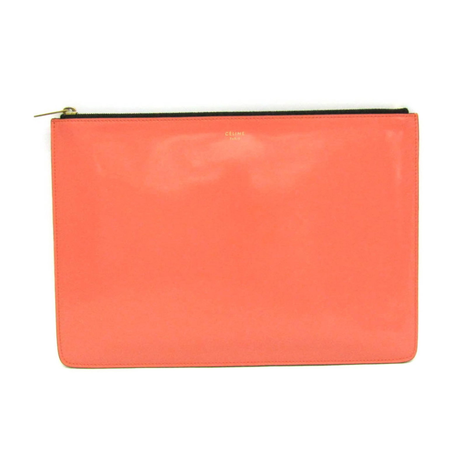 Celine Clutch Leather Bag: Celine Clutch Leather Bag Salmon pink pasted leather makes this Celine clutch bag a stylish and eye-catching accessory. With its gold hardware and zipper closure, this bag exudes a touch of luxury and